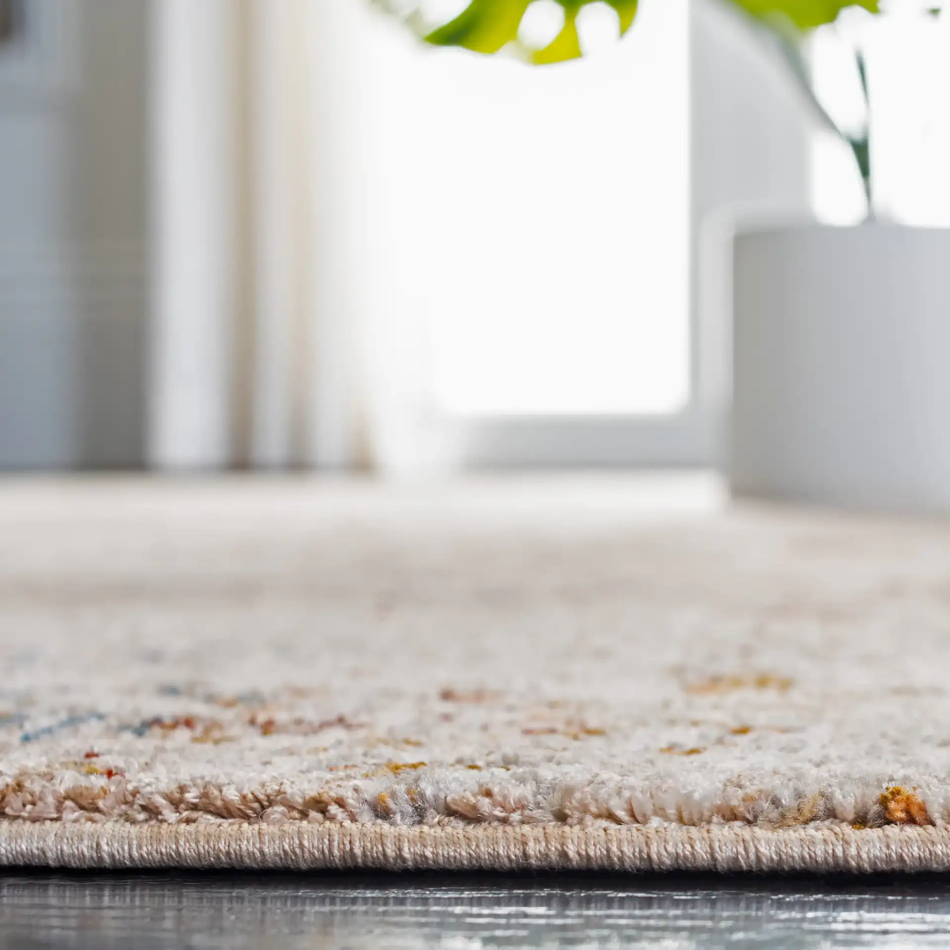 Limitee Mottled Abstract Rug in Beige in a styled room