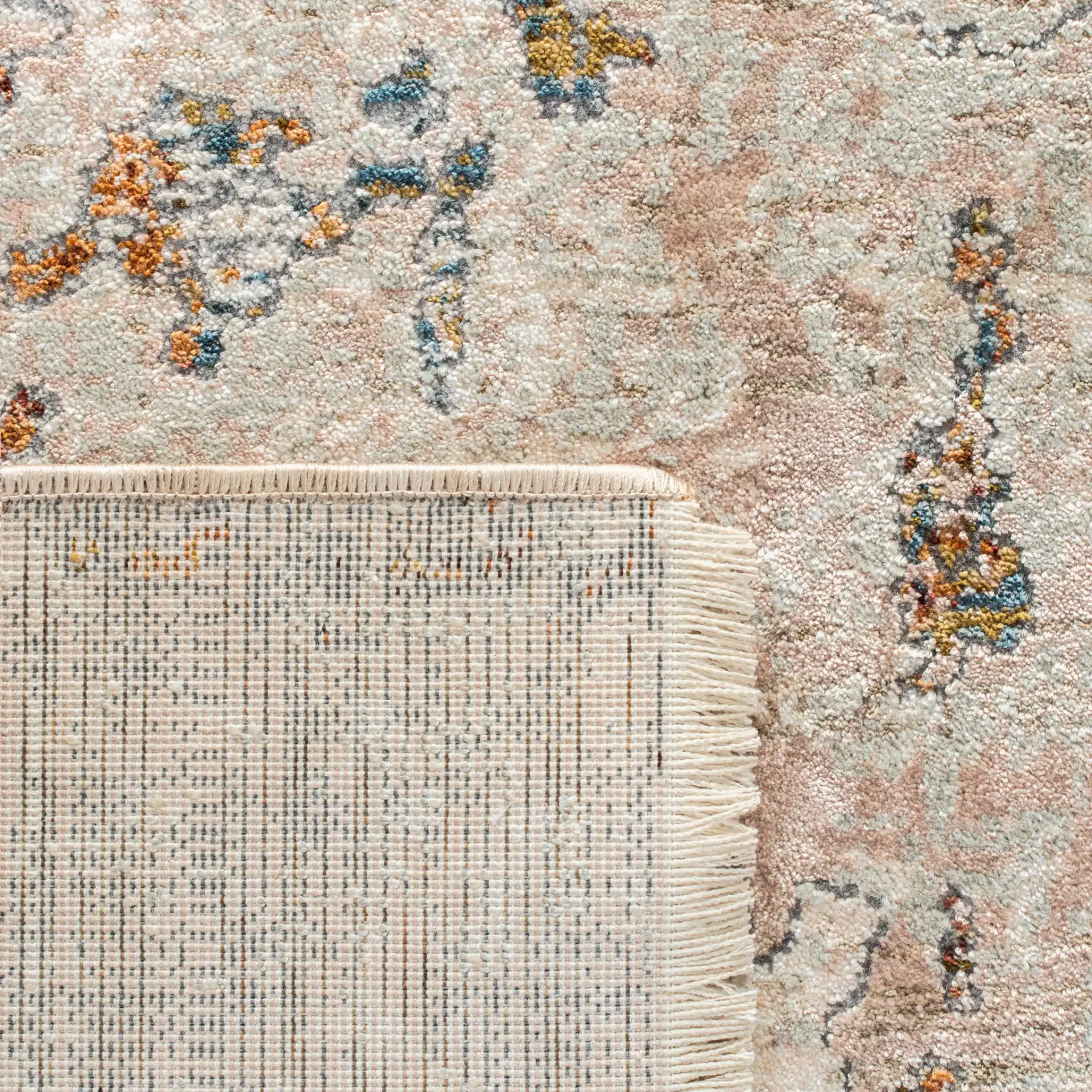 Limitee Mottled Abstract Rug in Beige in a styled room