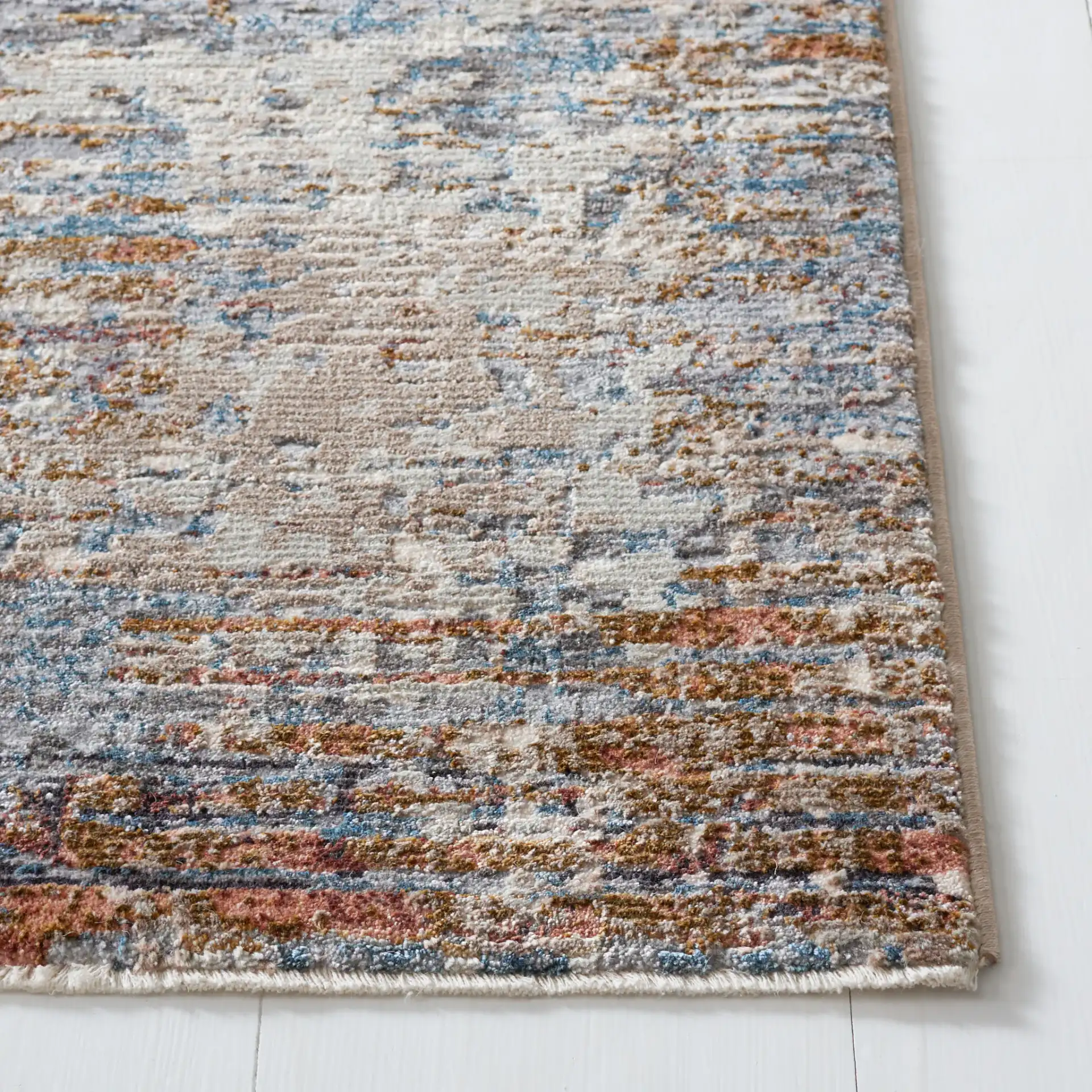 Limitee Striated Abstract Rug in Beige in a styled room