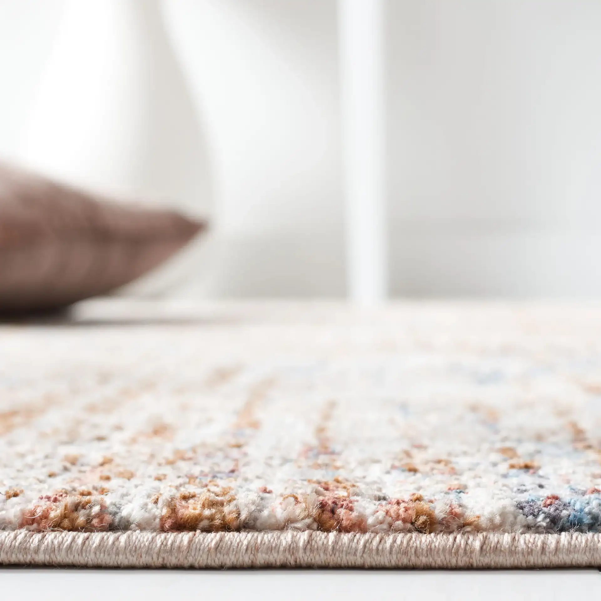 Limitee Striated Abstract Rug in Beige in a styled room