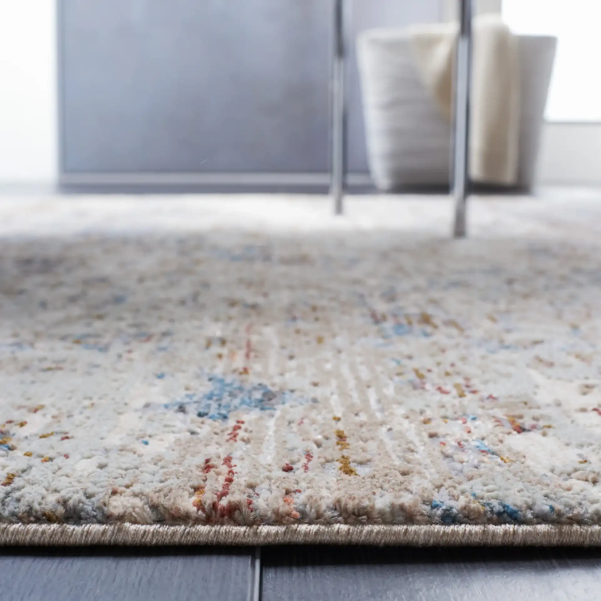 Limitee Abstract Striation Rug in Beige in a styled room