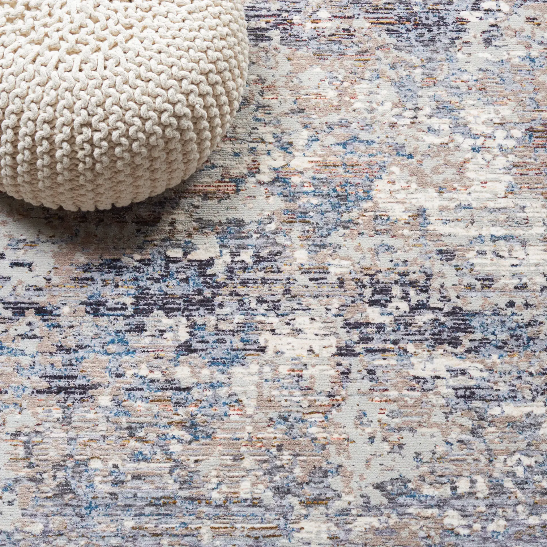 Limitee Abstract Striation Rug in Beige in a styled room