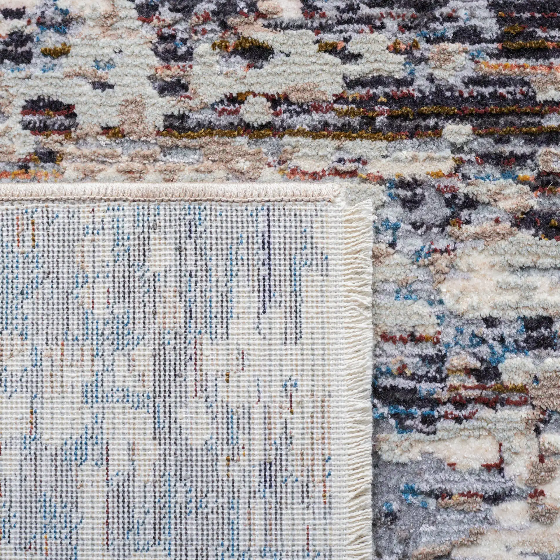 Limitee Abstract Striation Rug in Beige in a styled room