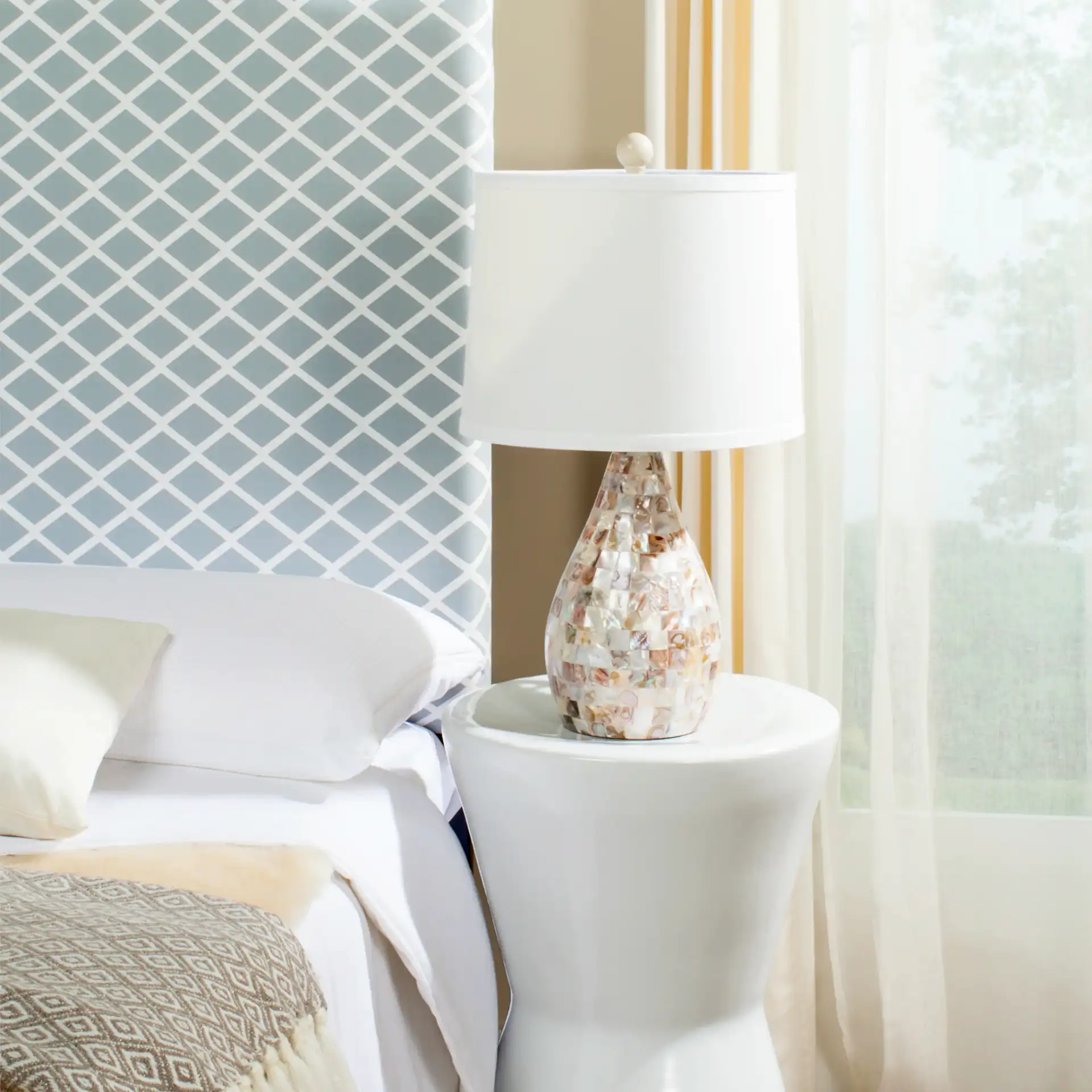 Lauralie Table Lamp (Set Of 2) in Ivory in a styled room