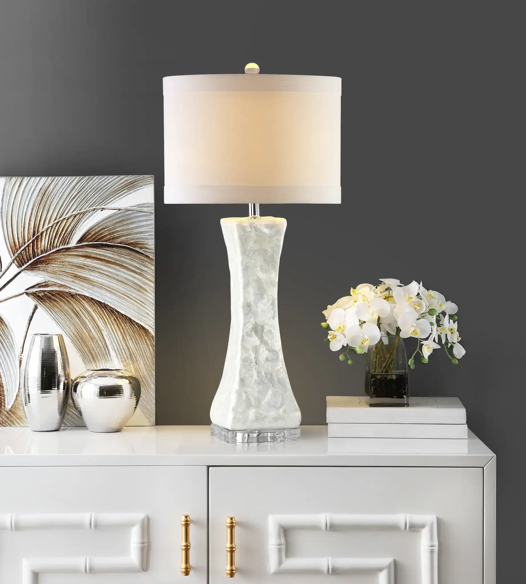 Shelley Concave Table Lamp in White in a styled room