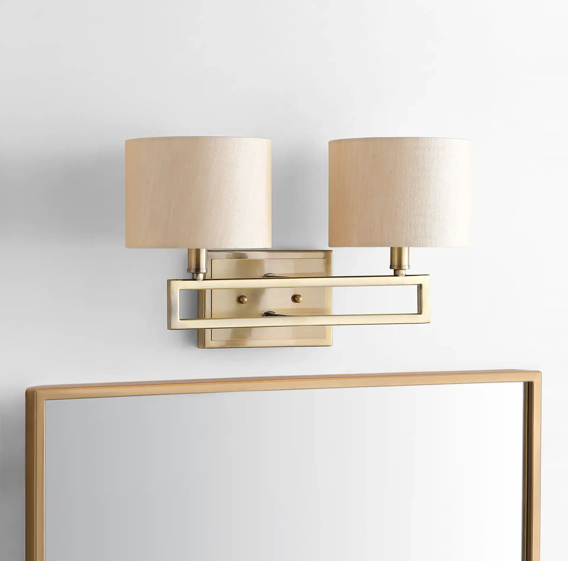 Catena Double Sconce in Gold in a styled room