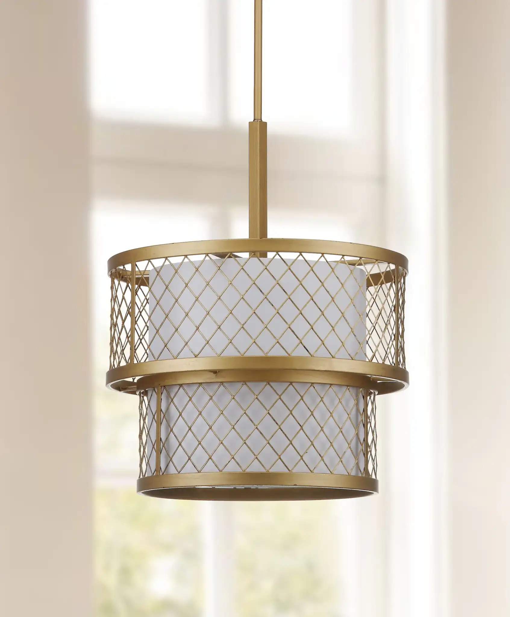 Evie Mesh Pendant Light in Gold in a styled room
