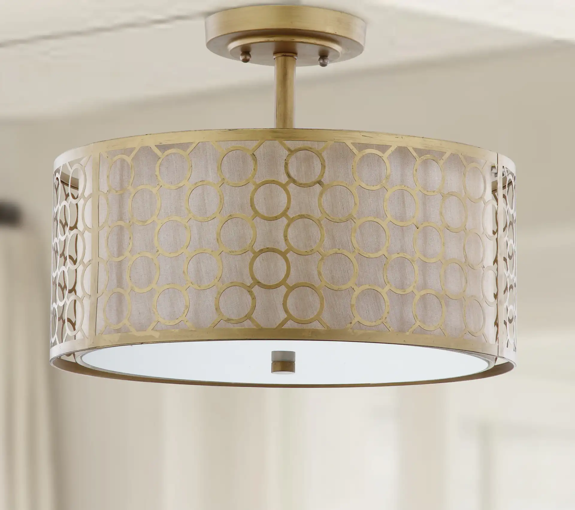 Giotta Ceiling Light in Antique Gold in a styled room
