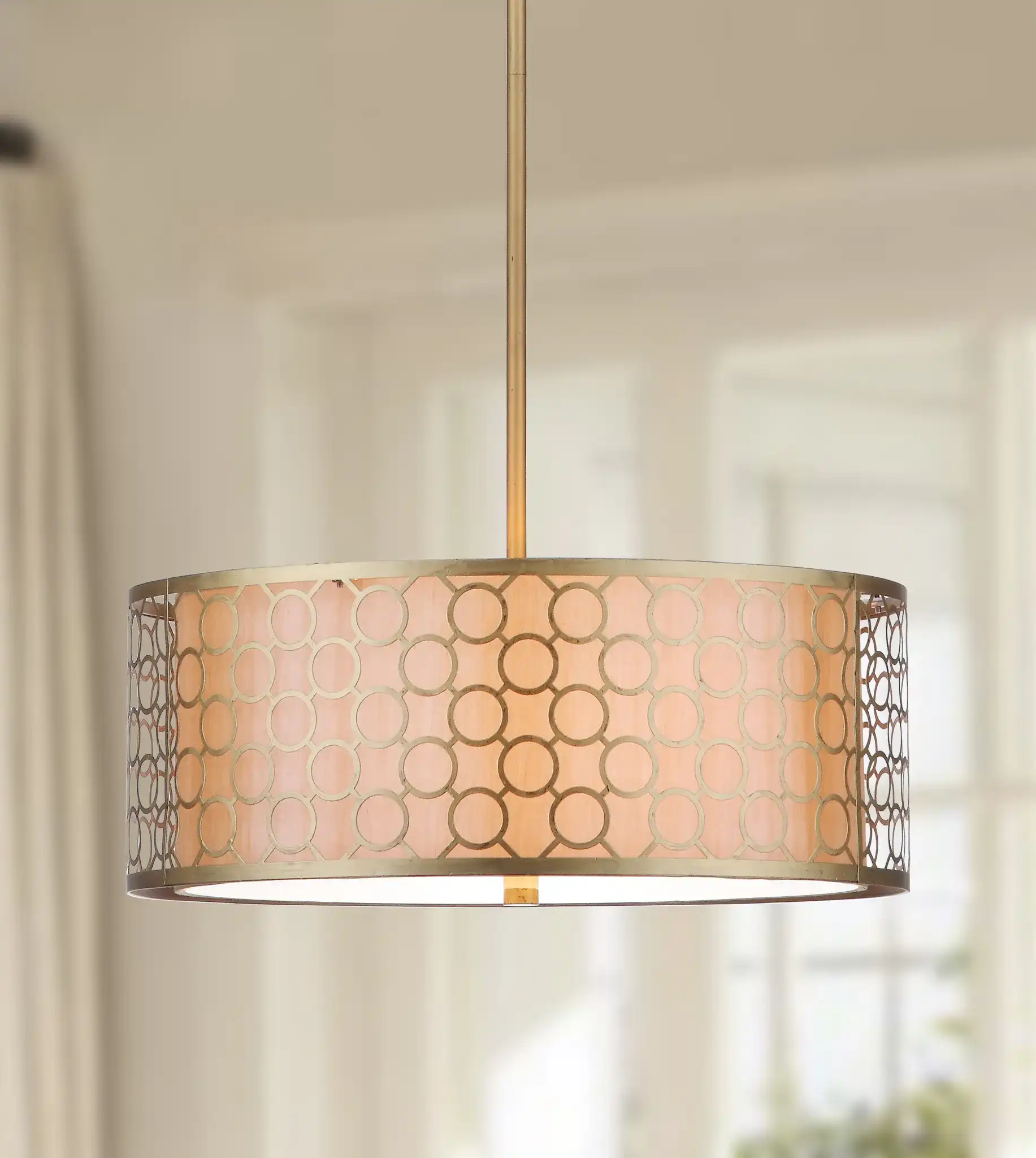 Giotta Drum Pendant Light in Antique Gold in a styled room