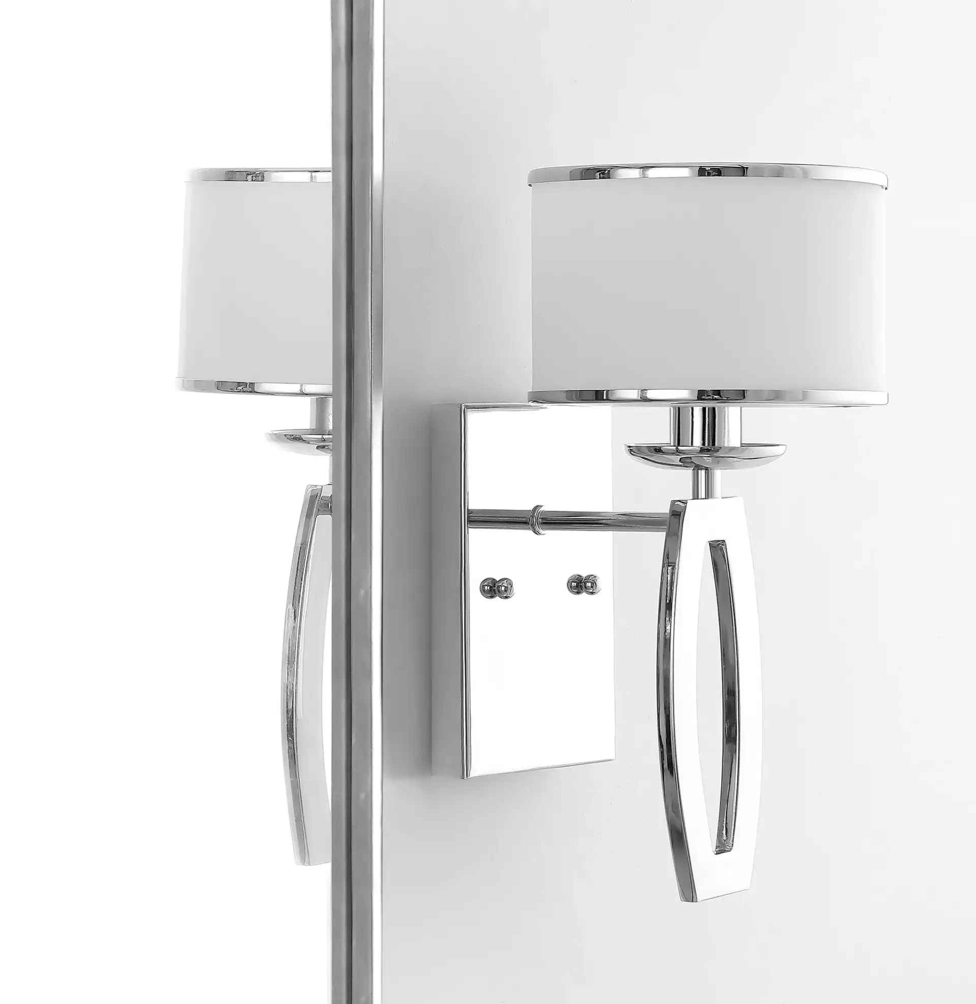 Lenora Drum Sconce (Set Of 2) in Chrome in a styled room