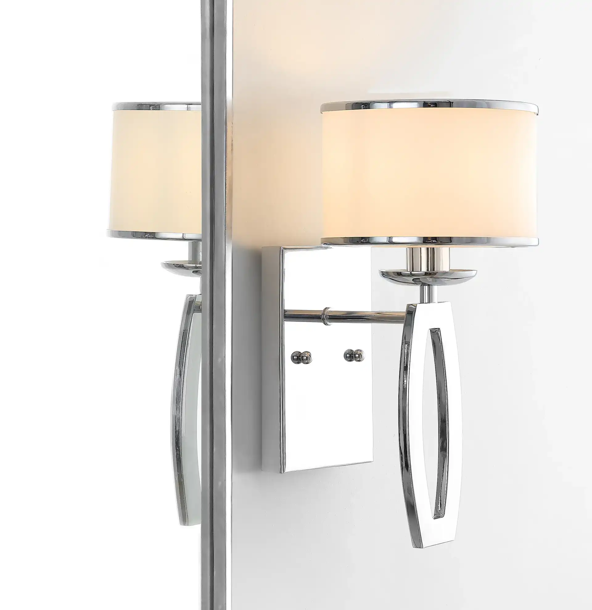 Lenora Drum Sconce (Set Of 2) in Chrome in a styled room