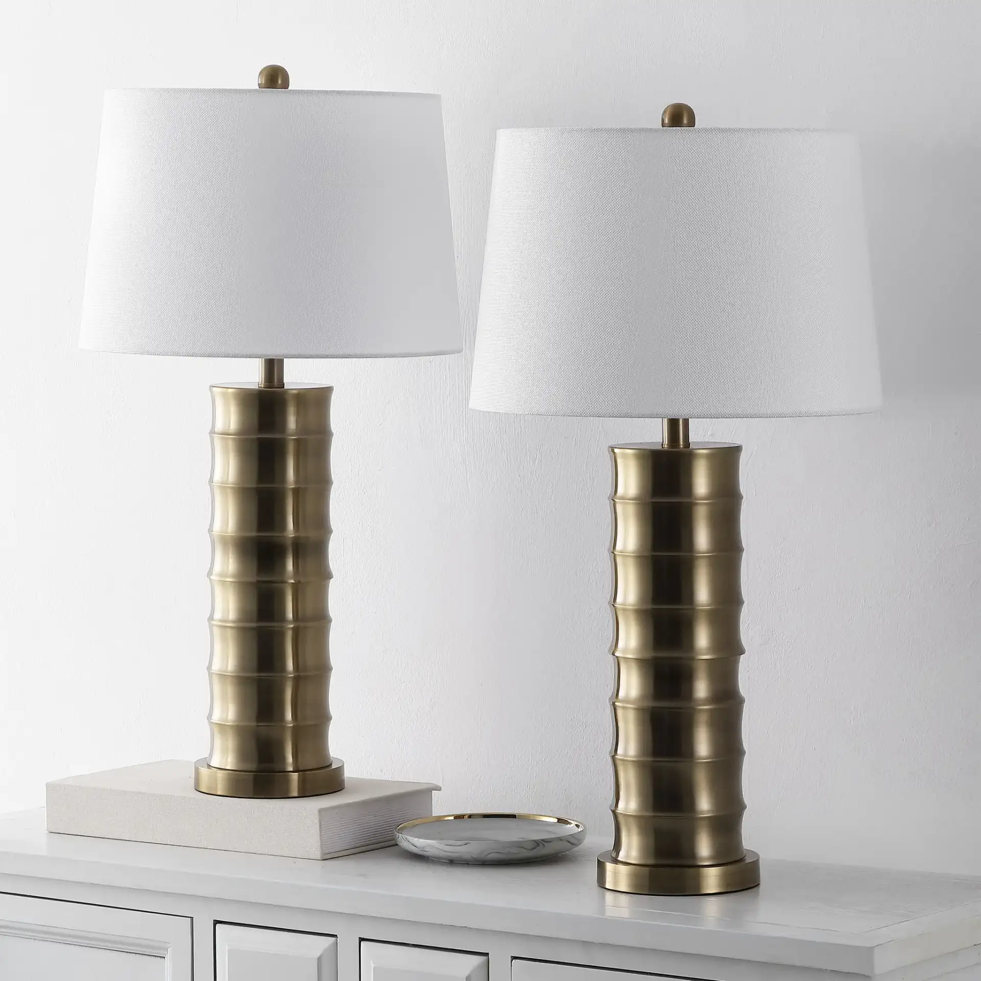 Linus Brass Column Lamp (Set of 2) in Gold in a styled room