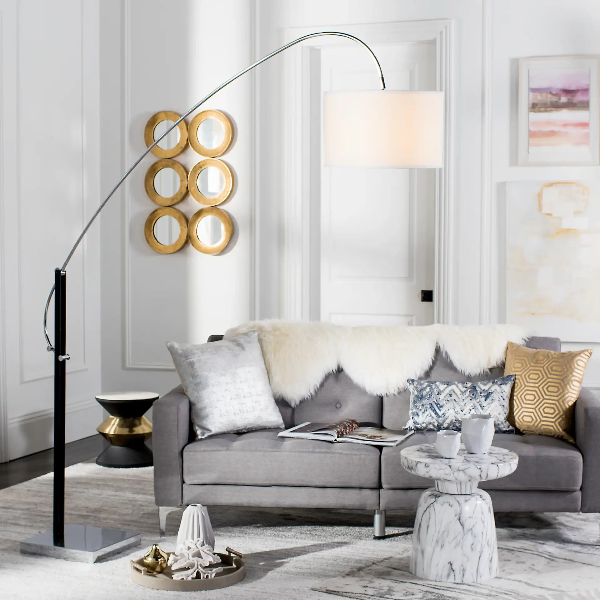 Lyra Arc Floor Lamp in Chrome in a styled room