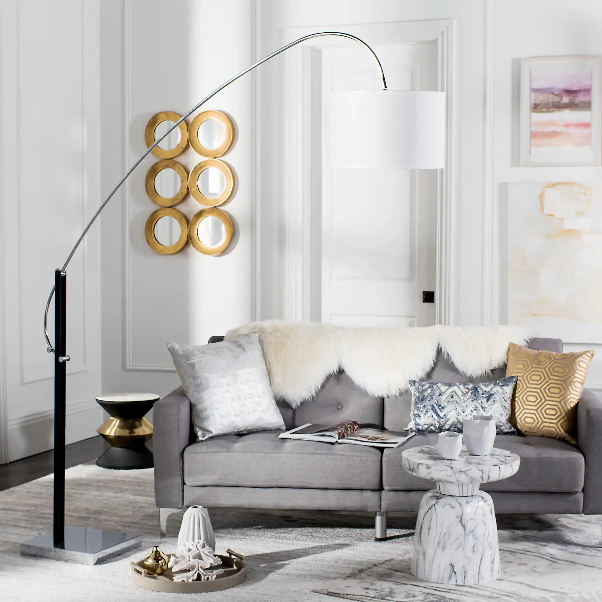 Lyra Arc Floor Lamp in Chrome in a styled room