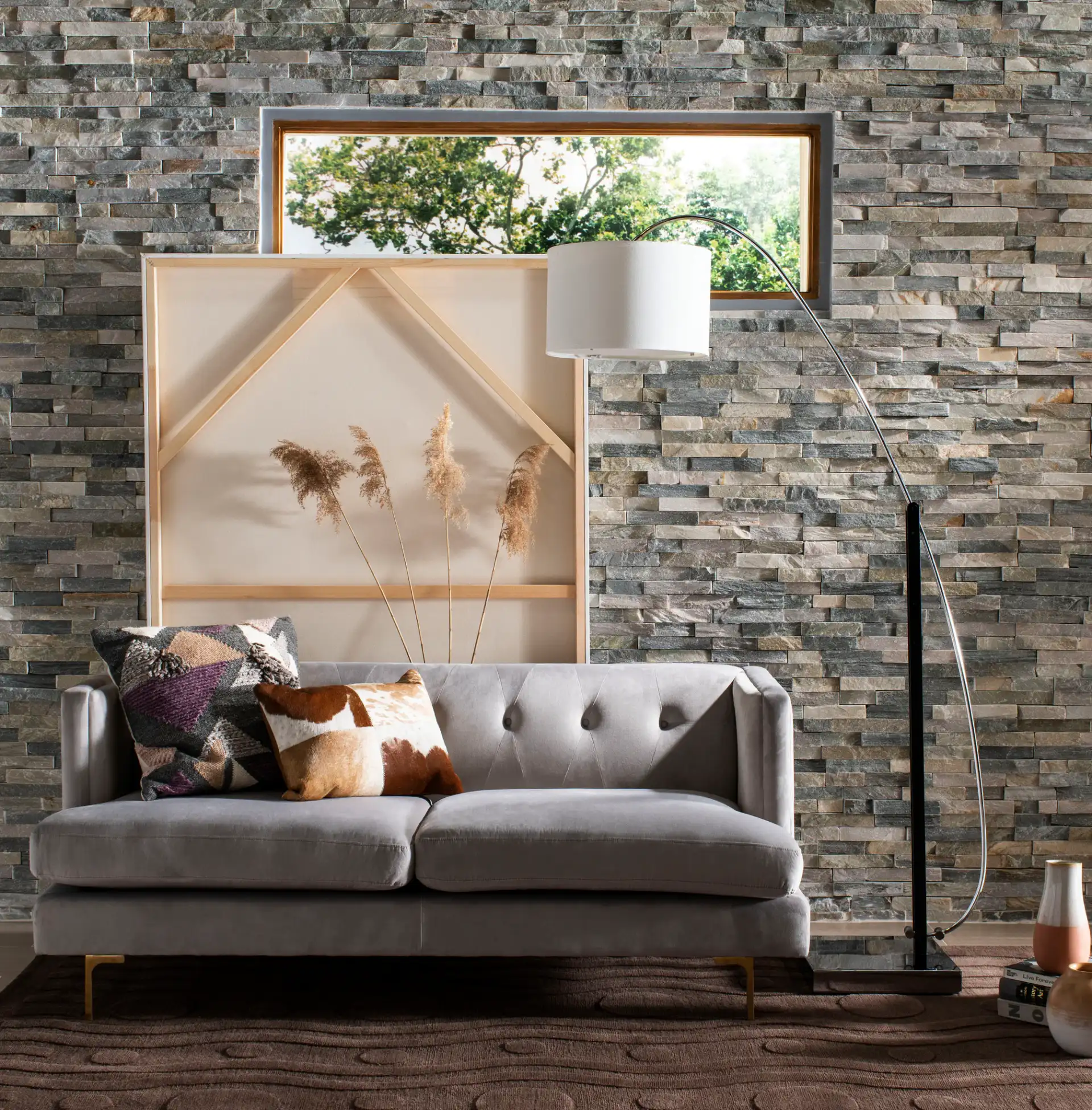 Lyra Arc Floor Lamp in Chrome in a styled room
