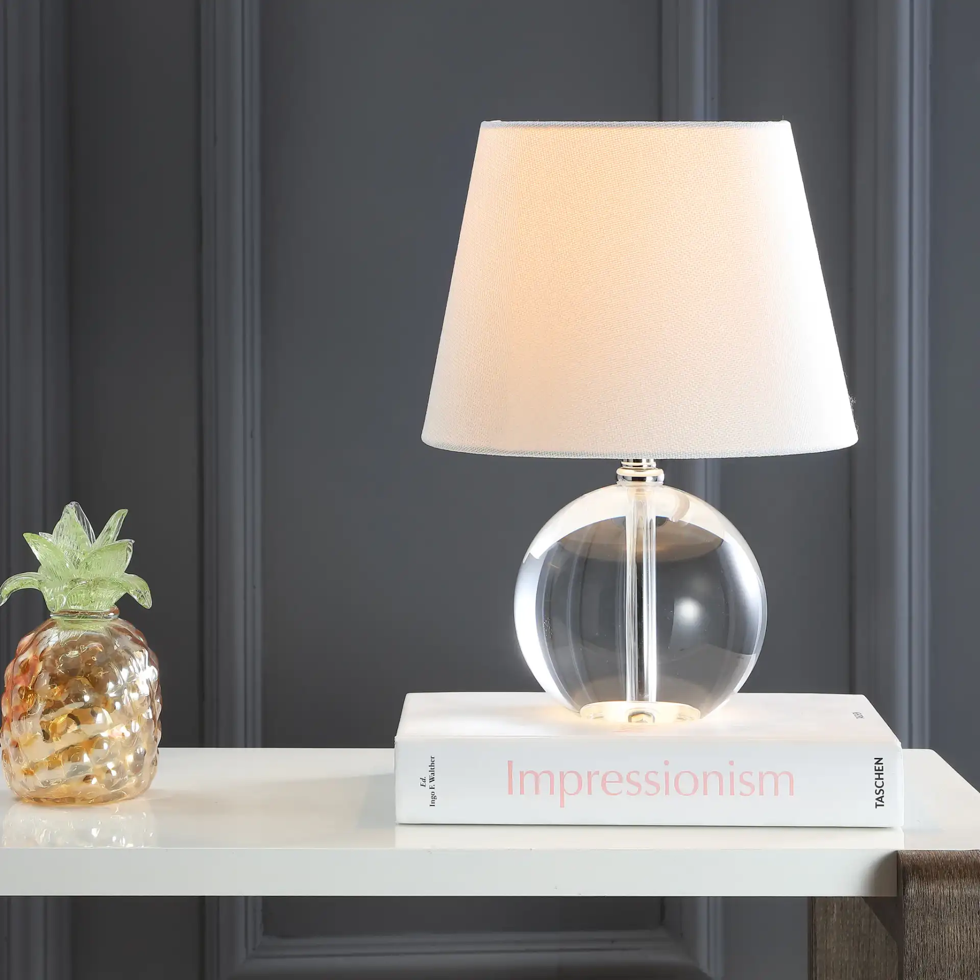 Mable Table Lamp in Clear / Off-White in a styled room