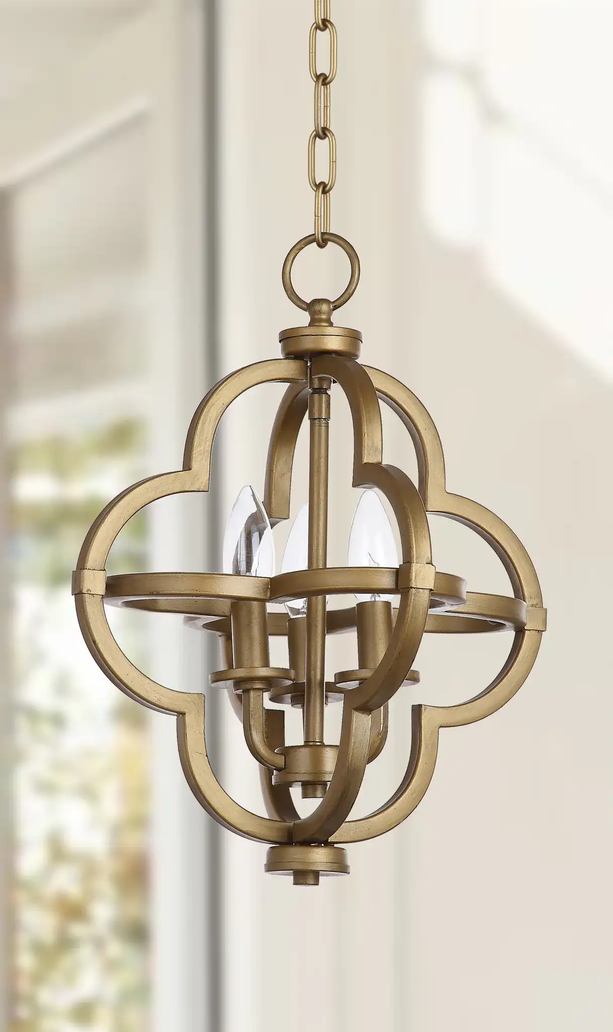 Mila Orb Pendant in Gold in a styled room