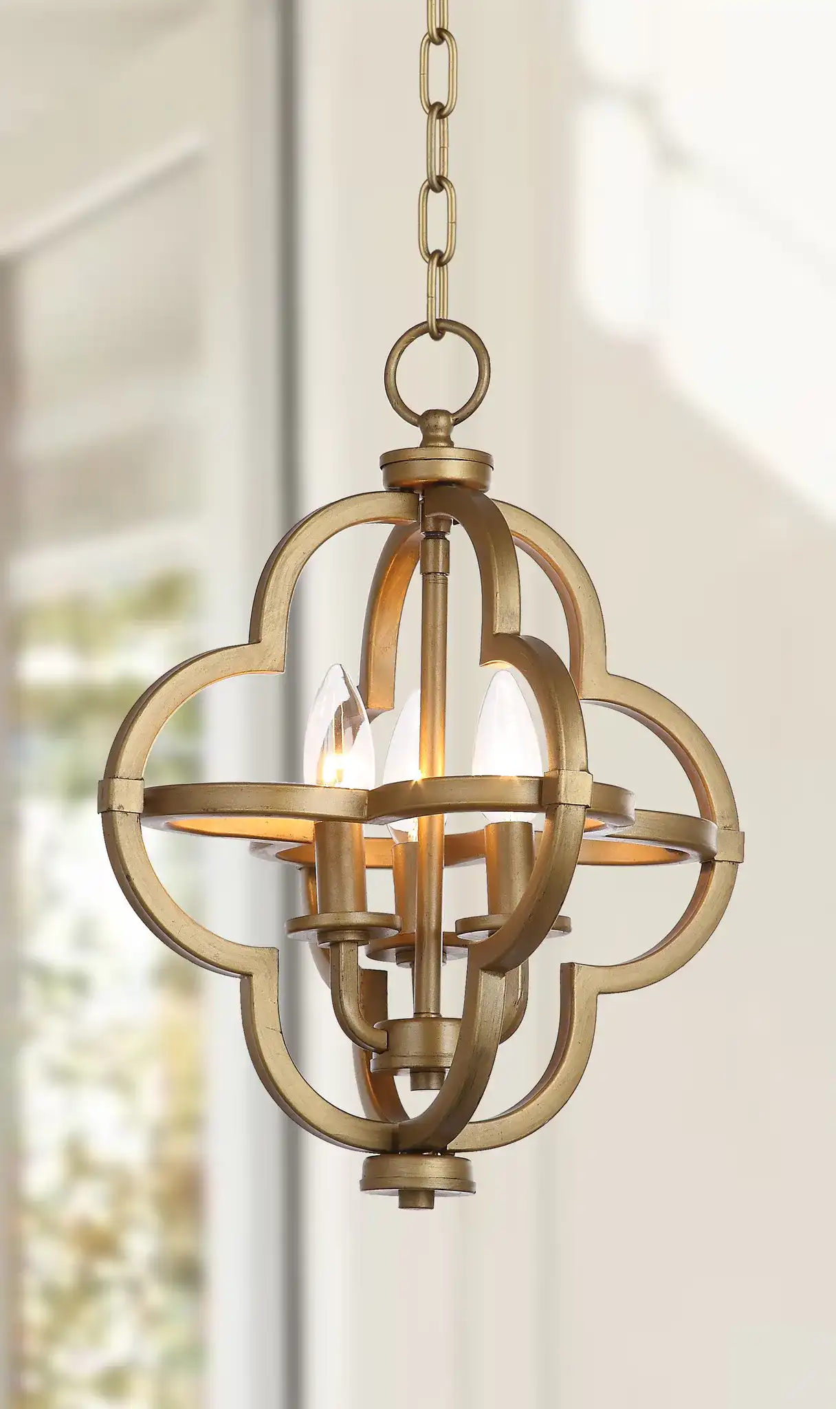 Mila Orb Pendant in Gold in a styled room