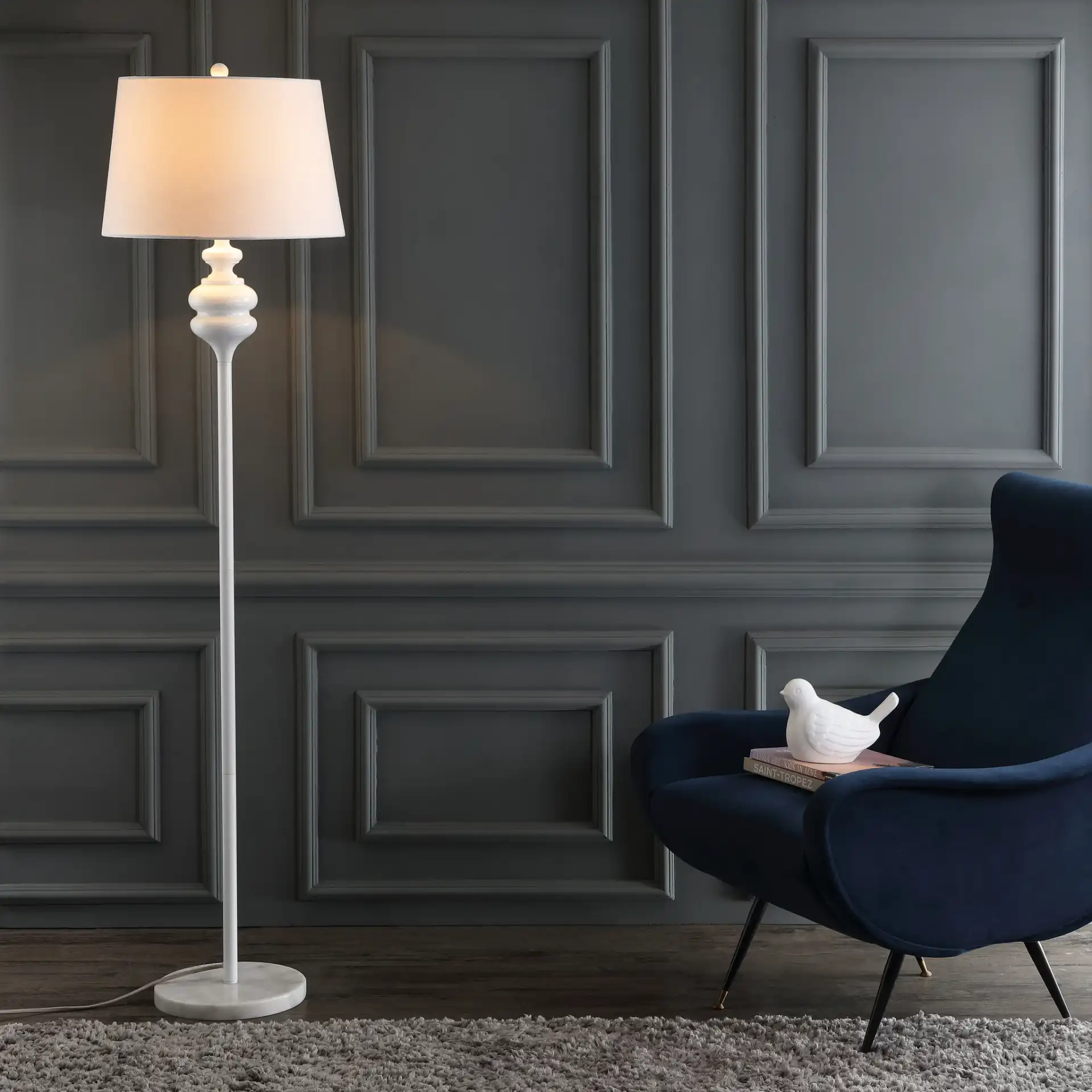 Torc Floor Lamp in White in a styled room