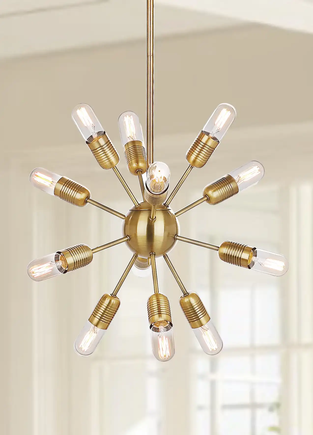 Raging Solace Pendant Lamp in Gold in a styled room