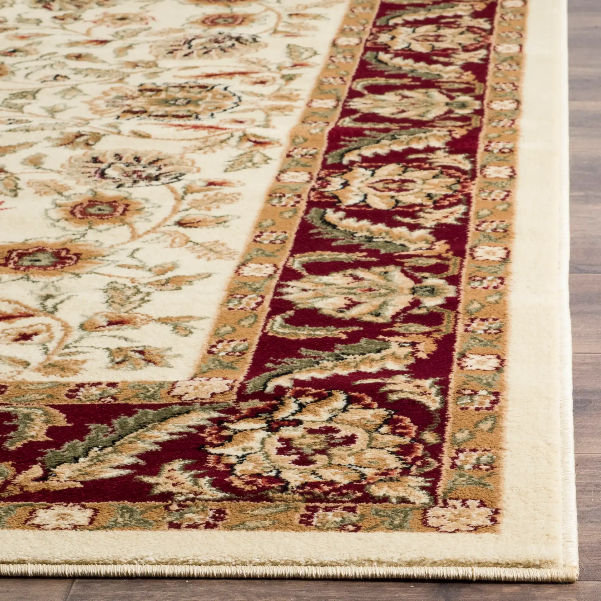 Lyndhurst Classic Floral Bordered Rug in Ivory / Red in a styled room