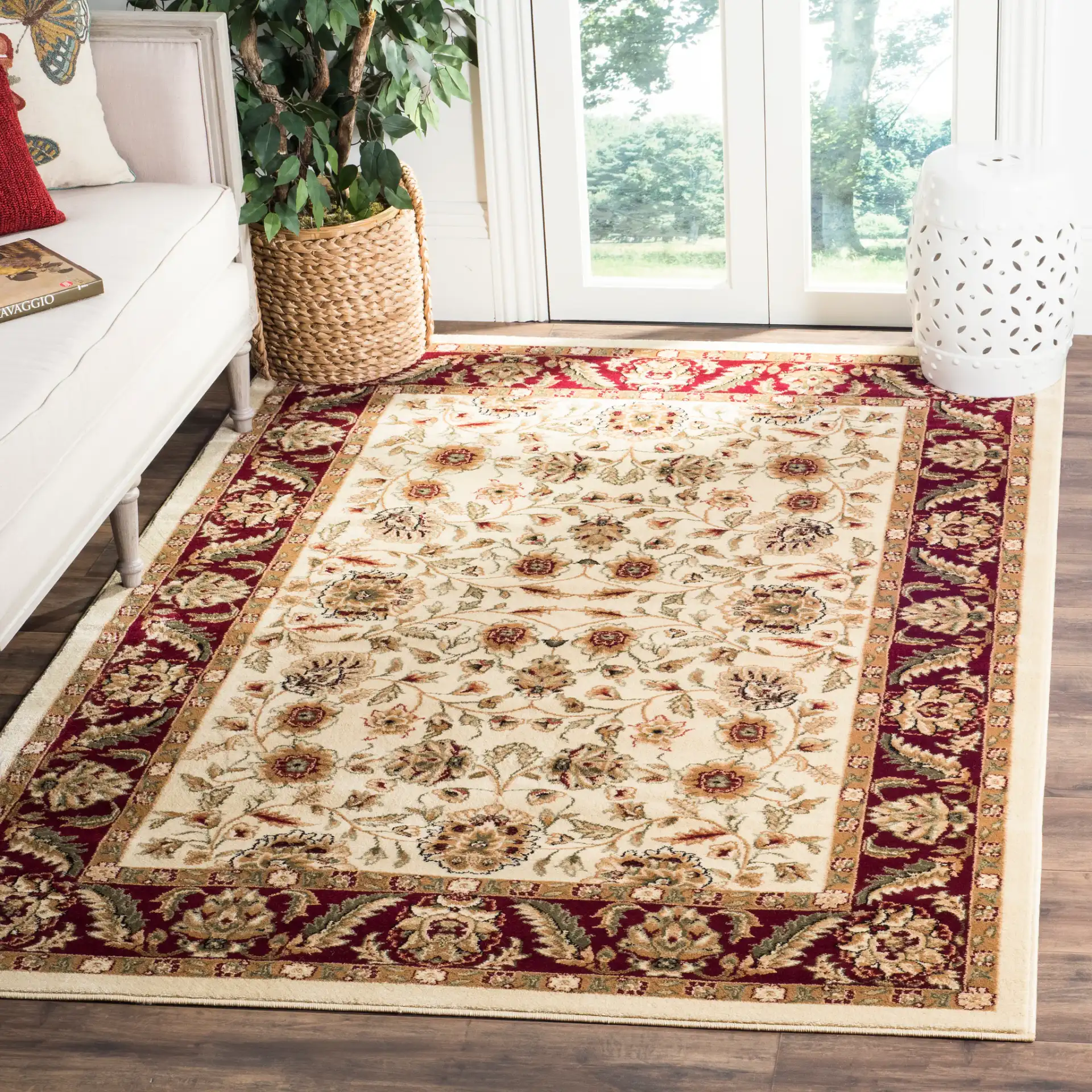 Lyndhurst Classic Floral Bordered Rug in Ivory / Red in a styled room