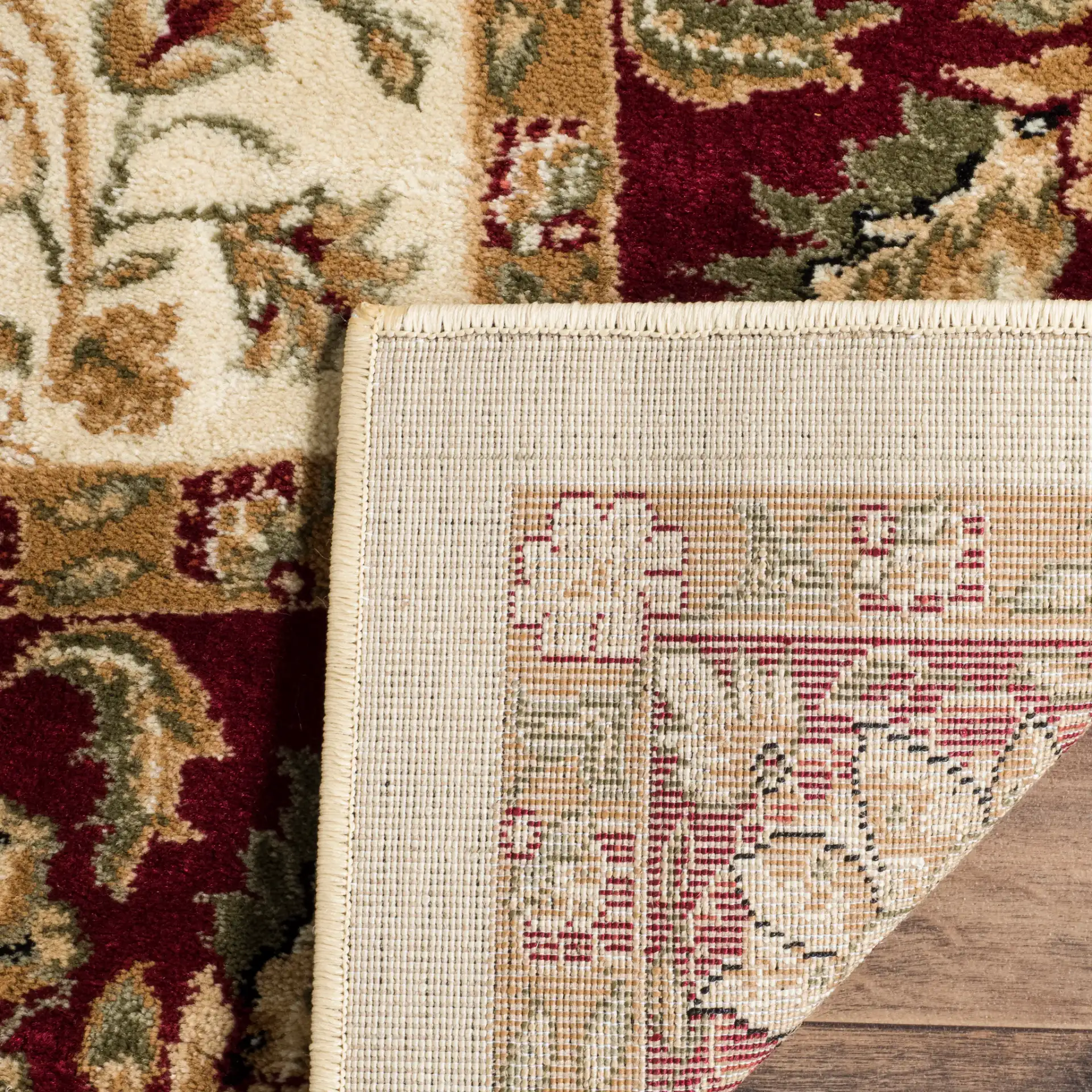 Lyndhurst Classic Floral Bordered Rug in Ivory / Red in a styled room