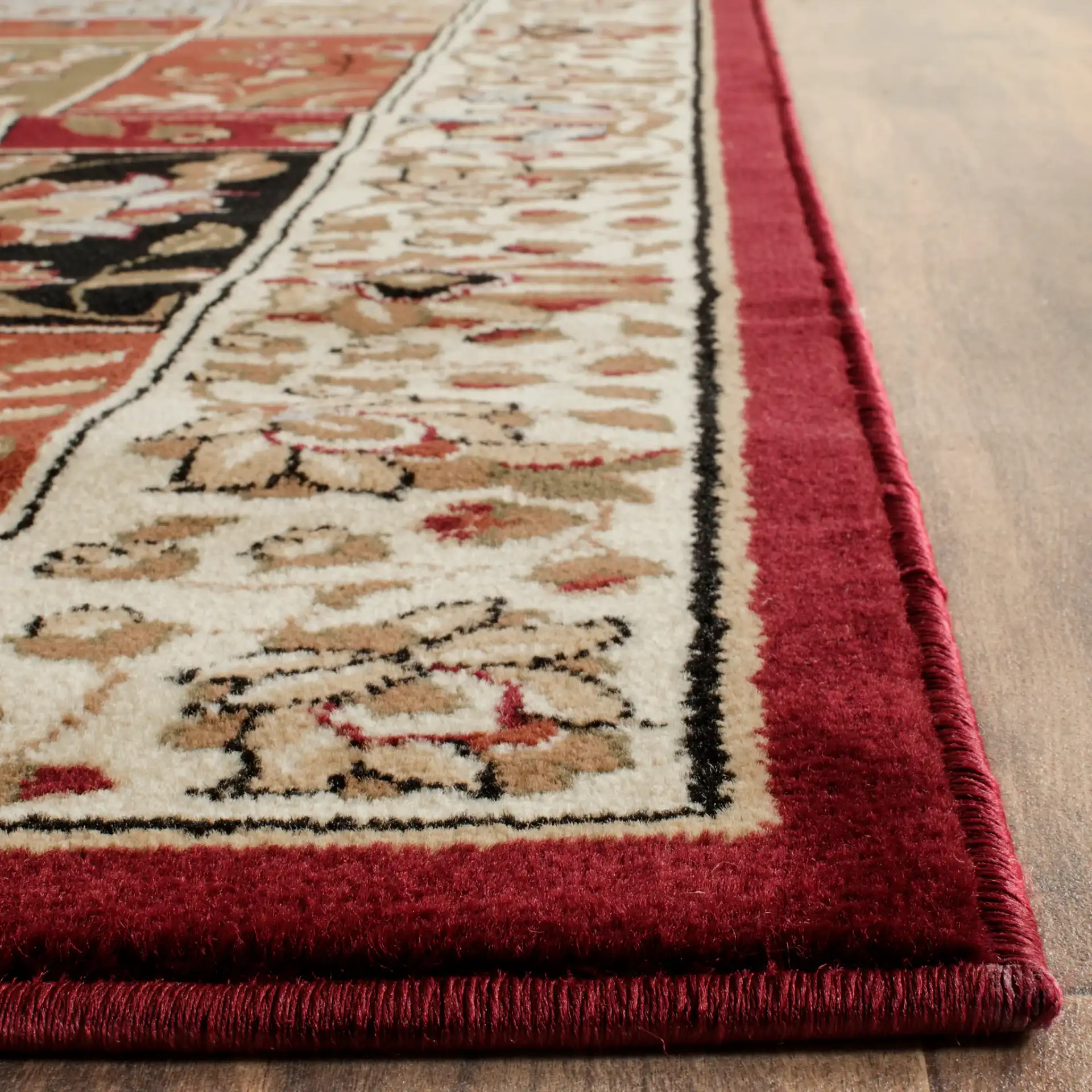 Lyndhurst Floral Patchwork Rug in Multicolor / Ivory in a styled room
