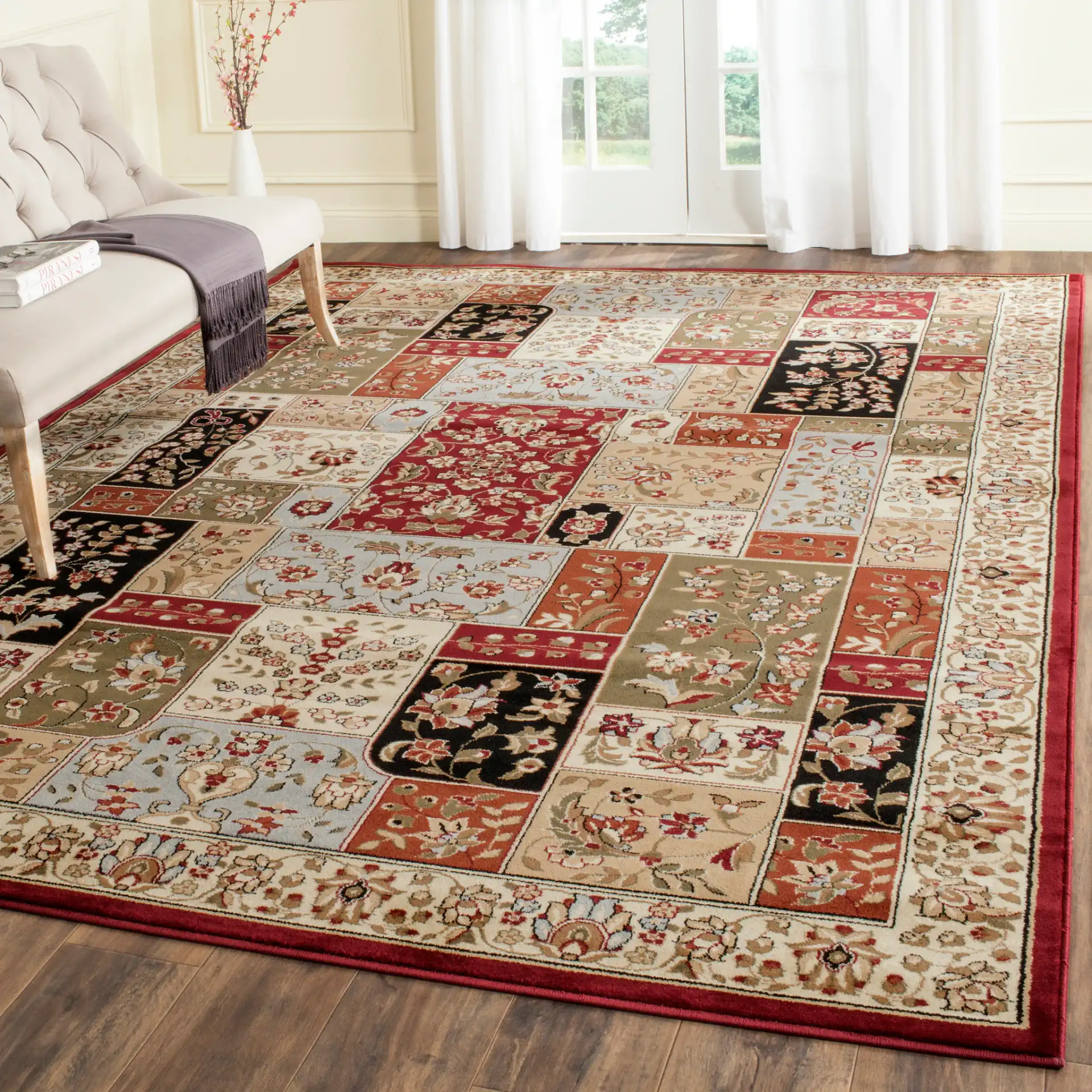 Lyndhurst Floral Patchwork Rug in Multicolor / Ivory in a styled room