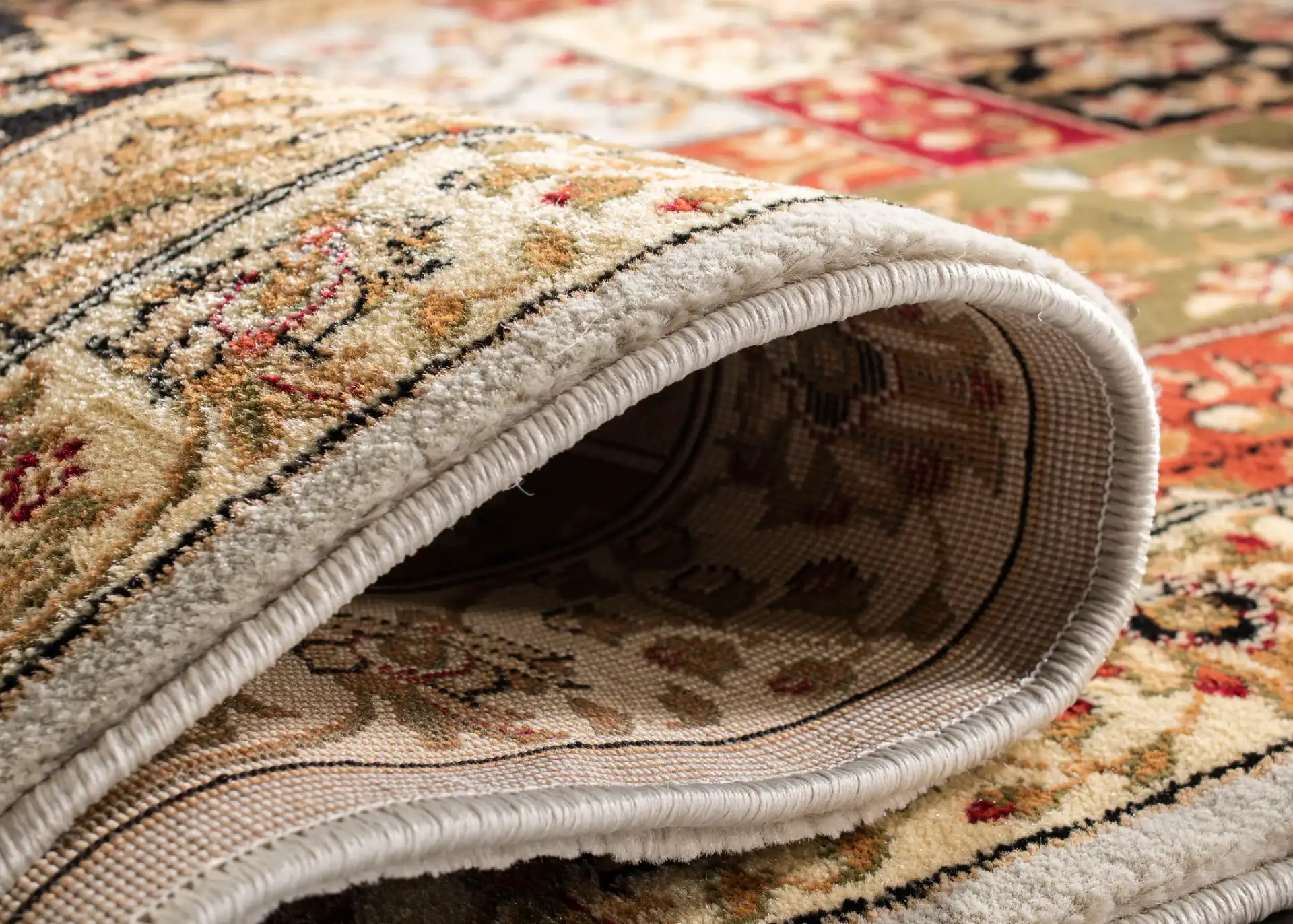 Lyndhurst Floral Patchwork Rug in Multicolor / Ivory in a styled room