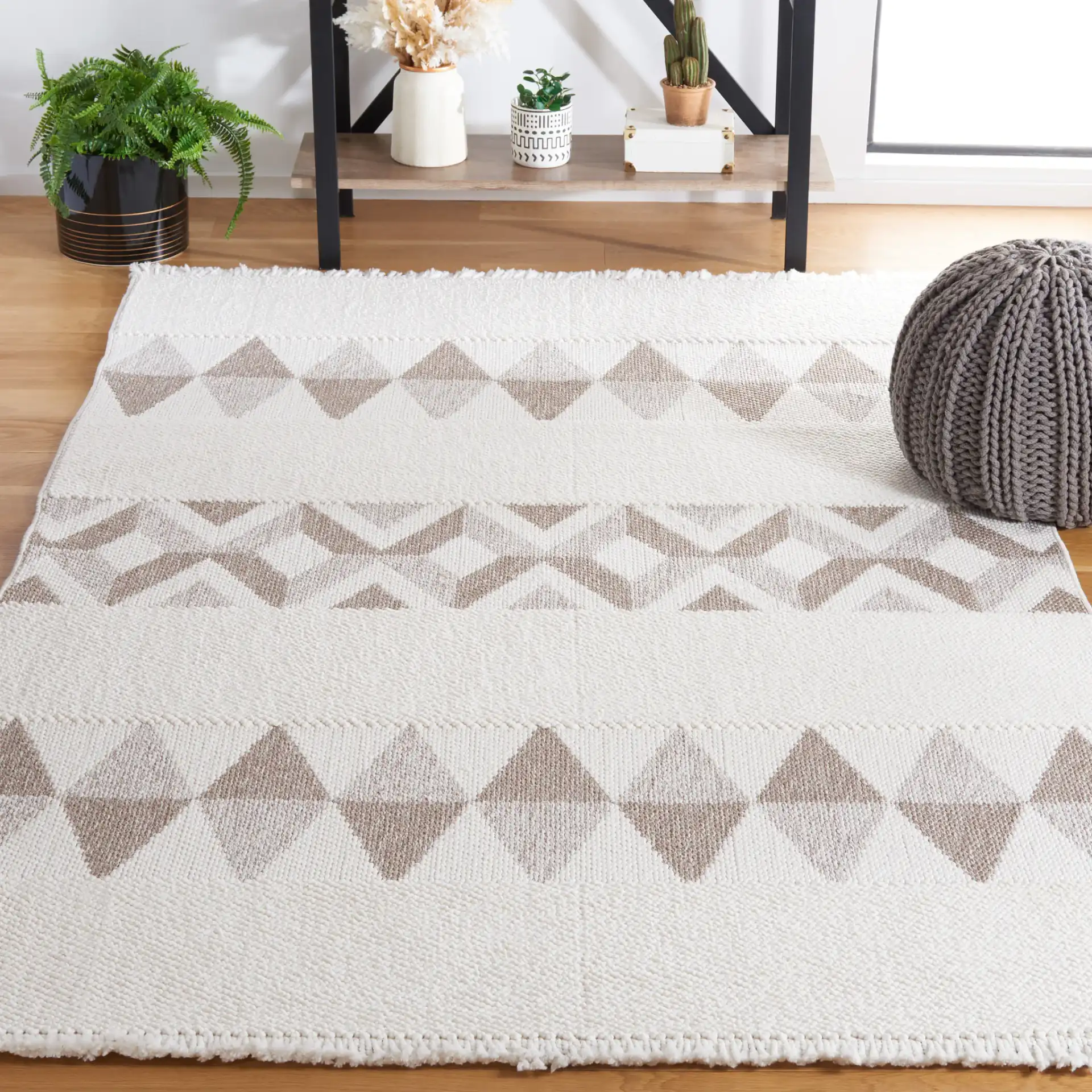 Lotus Banded Chevron Rug in Ivory / Beige in a styled room