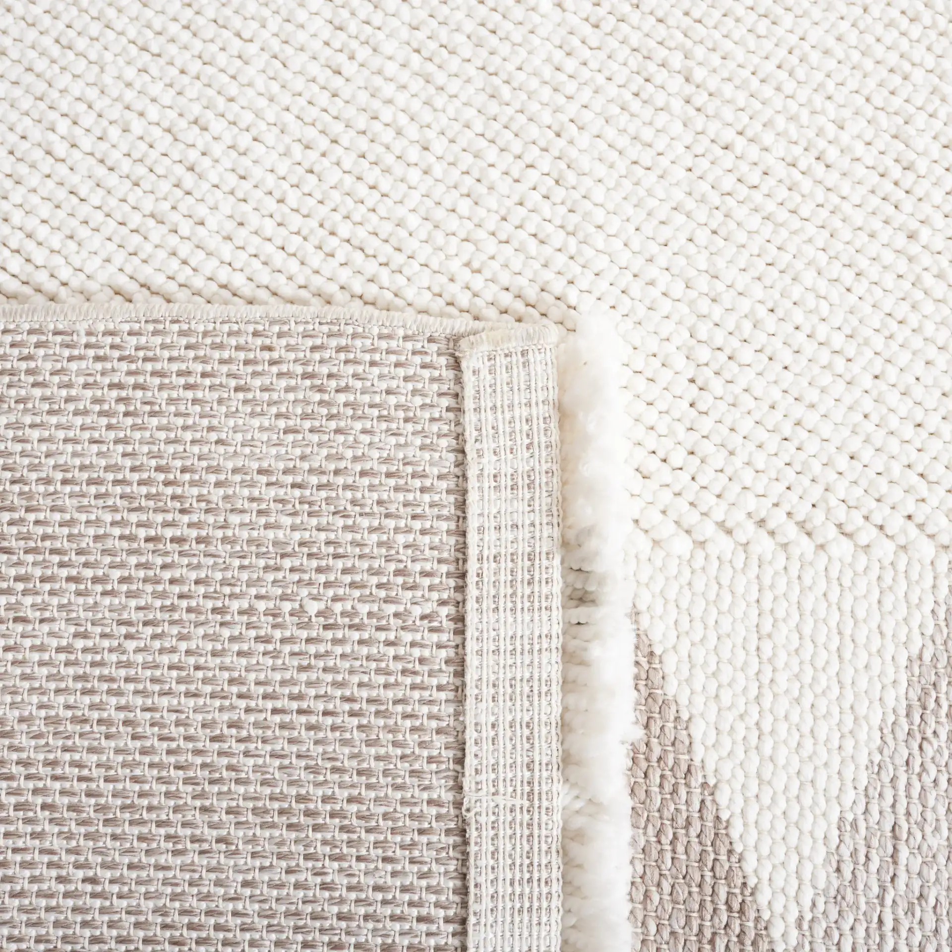 Lotus Banded Chevron Rug in Ivory / Beige in a styled room