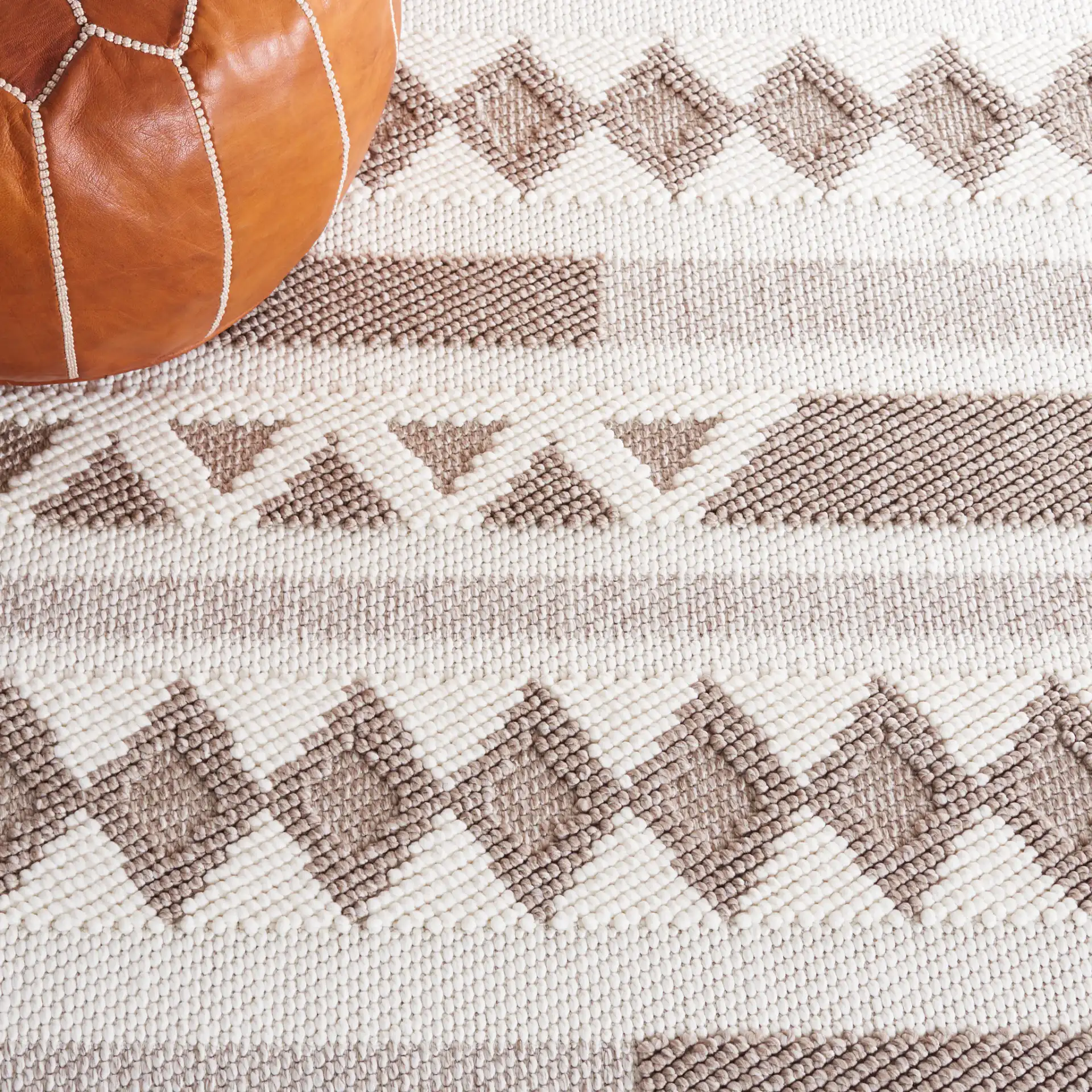 Lotus Banded Diamond Rug in Ivory / Beige in a styled room