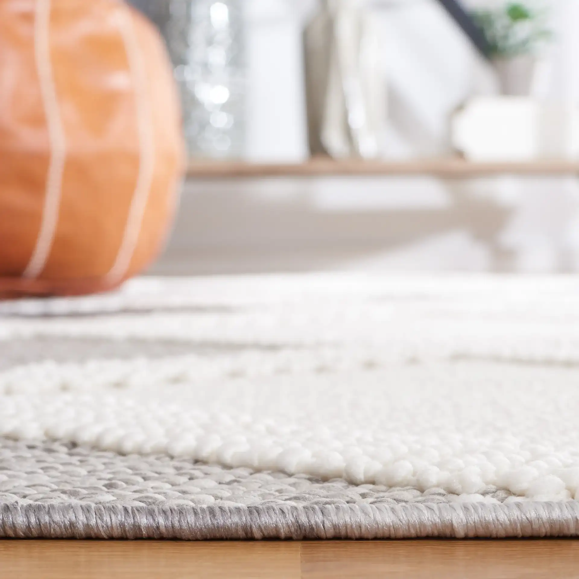 Lotus Diamond Lattice Rug in Ivory / Dark Gray in a styled room