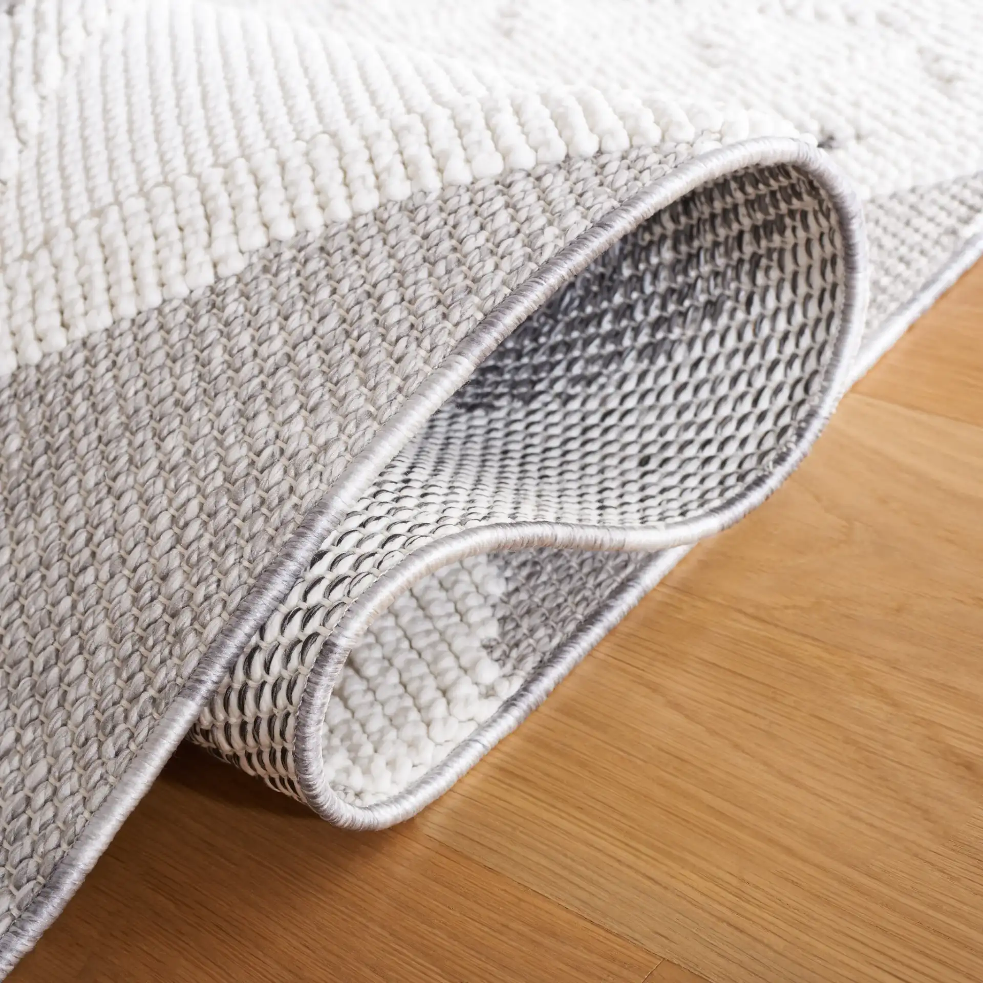 Lotus Diamond Lattice Rug in Ivory / Dark Gray in a styled room