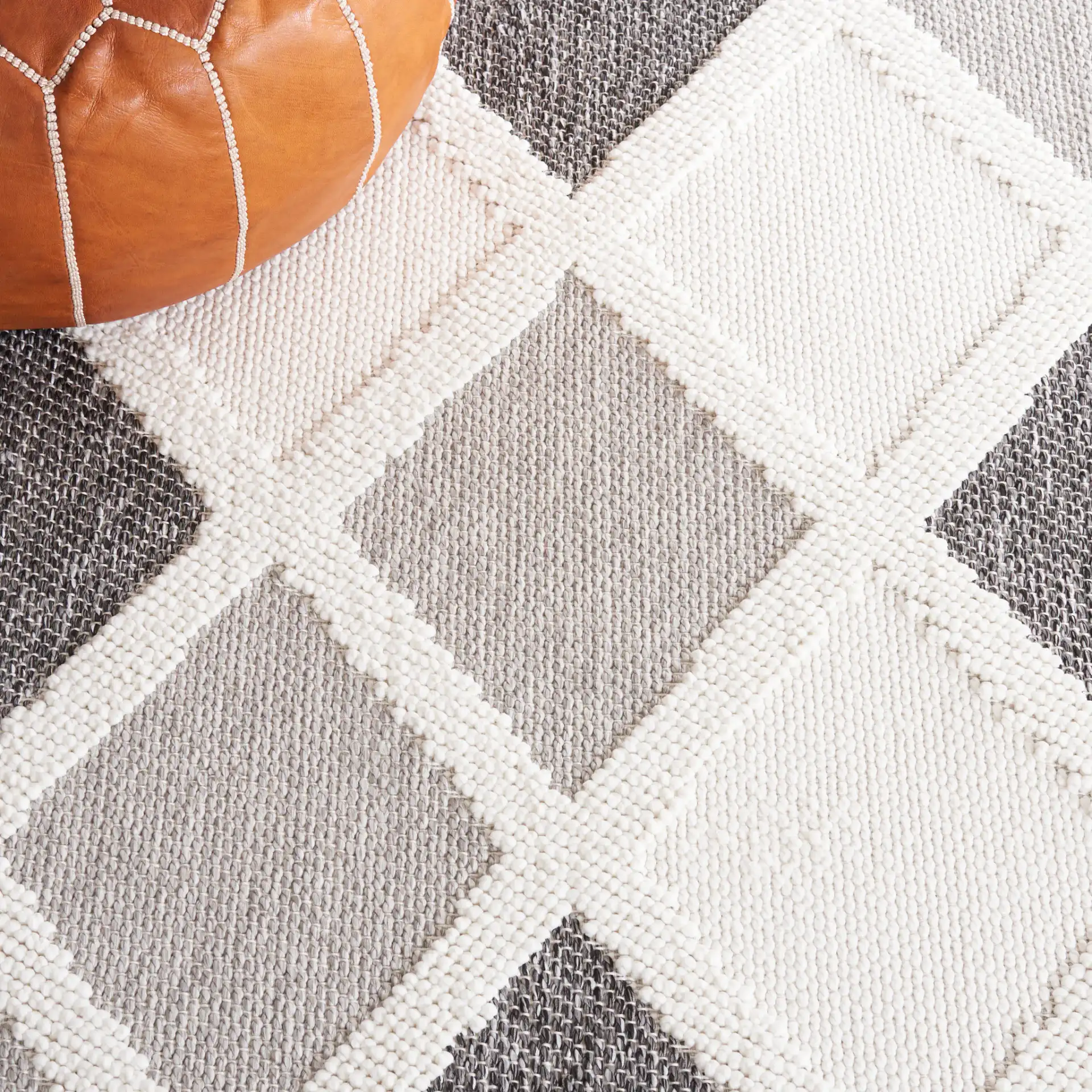 Lotus Diamond Lattice Rug in Ivory / Dark Gray in a styled room