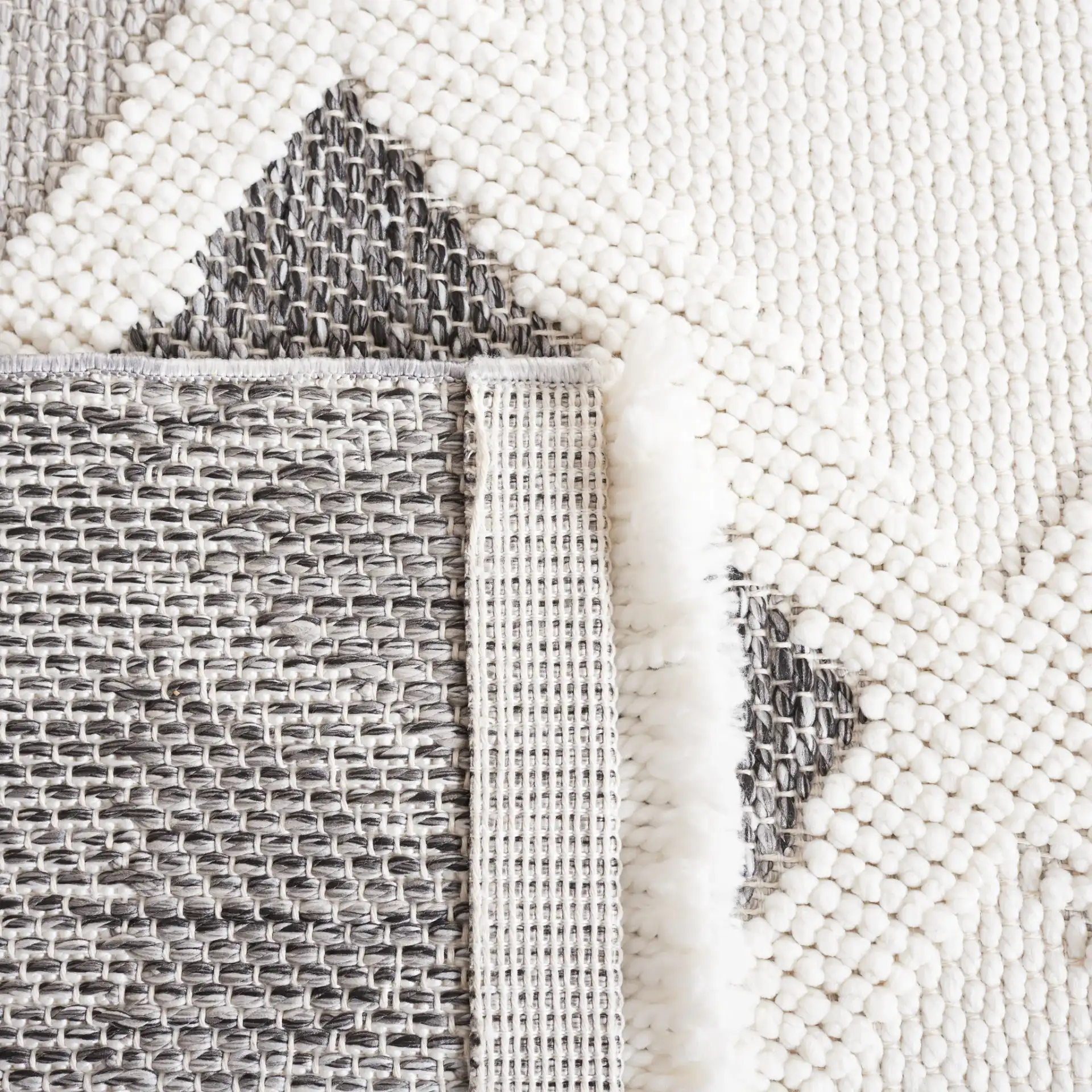 Lotus Diamond Lattice Rug in Ivory / Dark Gray in a styled room