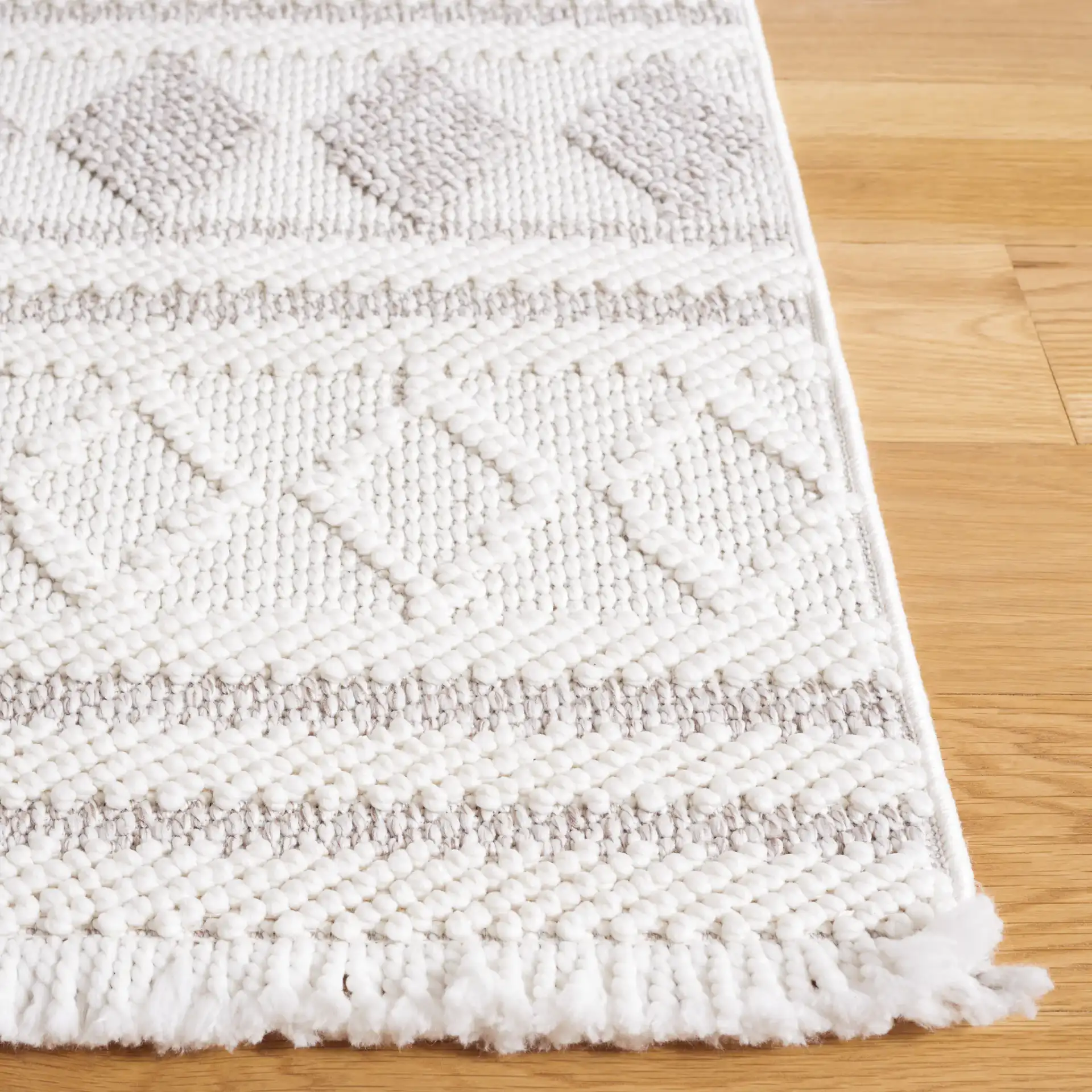 Lotus Scandinavian Diamond Rug in Ivory / Beige in a styled room