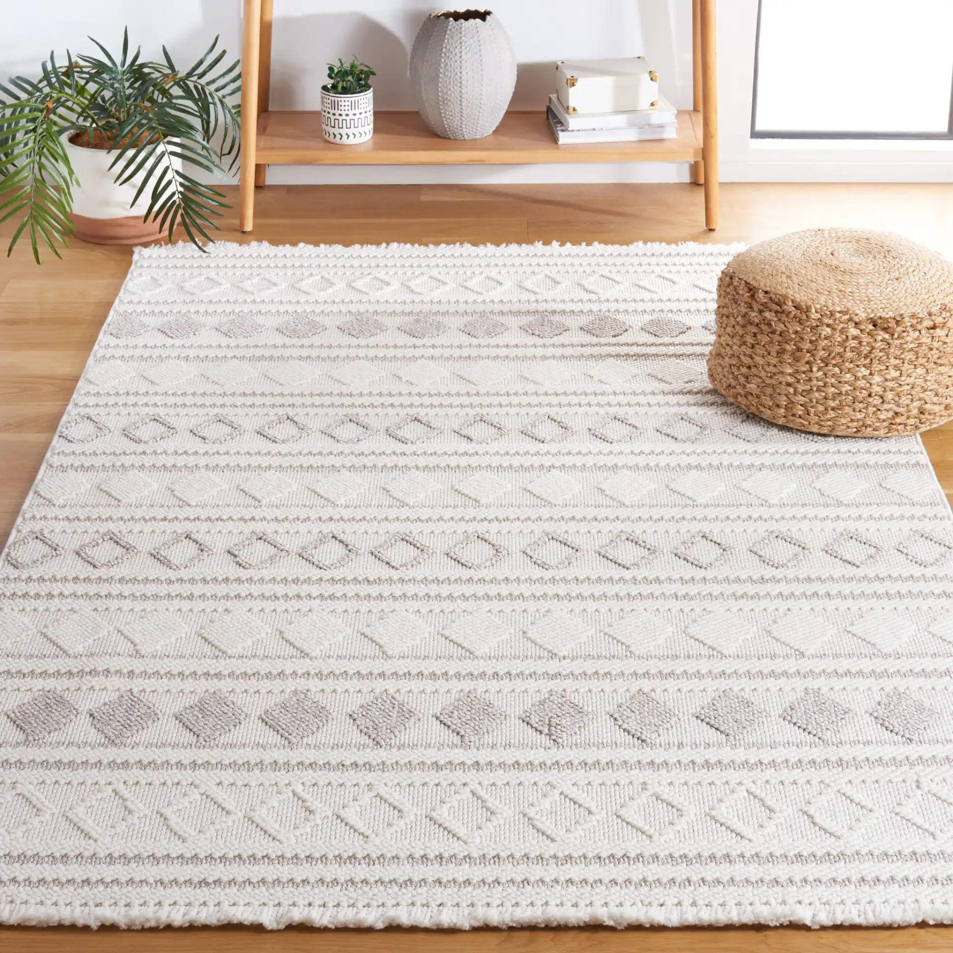 Lotus Scandinavian Diamond Rug in Ivory / Beige in a styled room