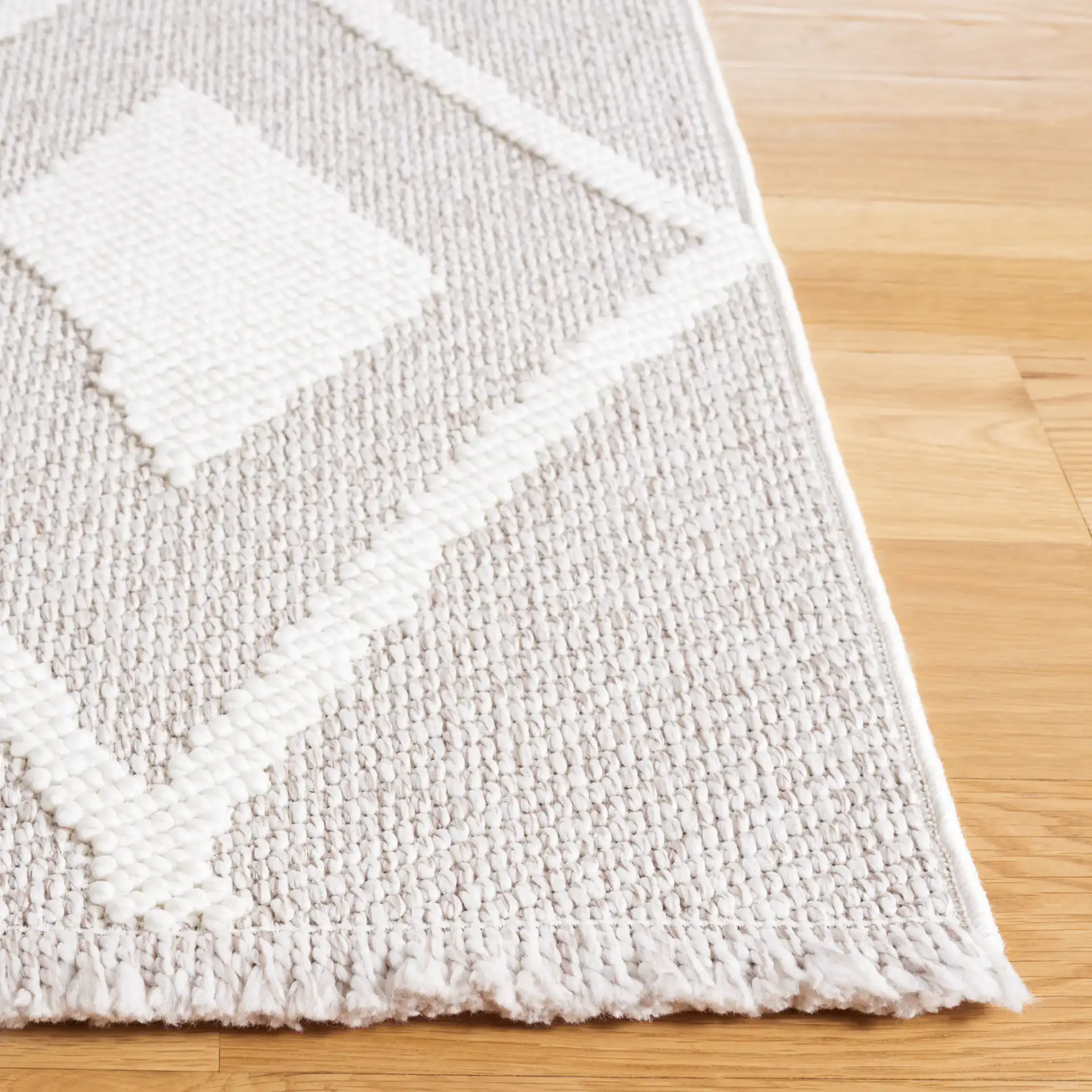 Lotus Nested Diamond Lattice Rug in Beige / Ivory in a styled room