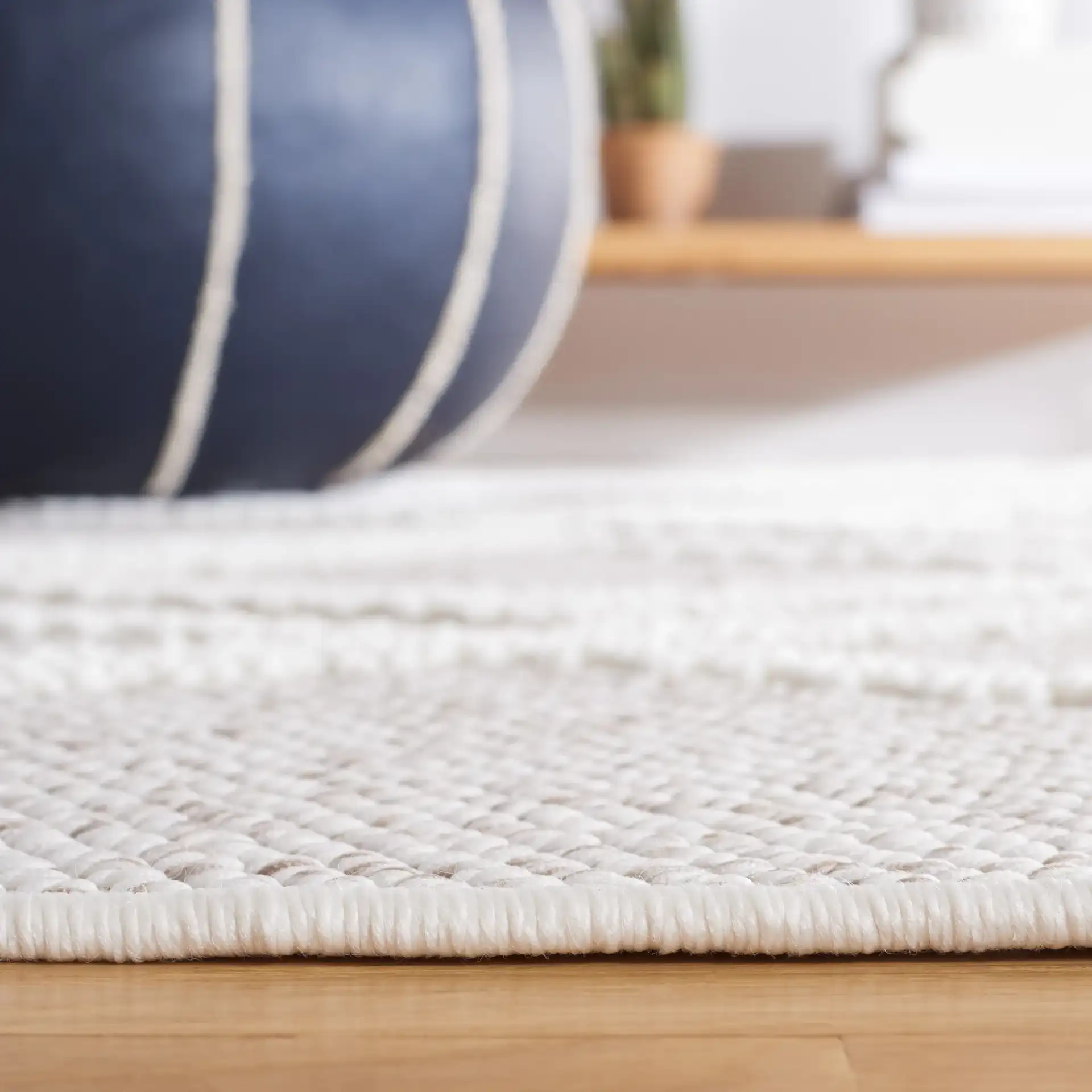 Lotus Nested Diamond Lattice Rug in Beige / Ivory in a styled room
