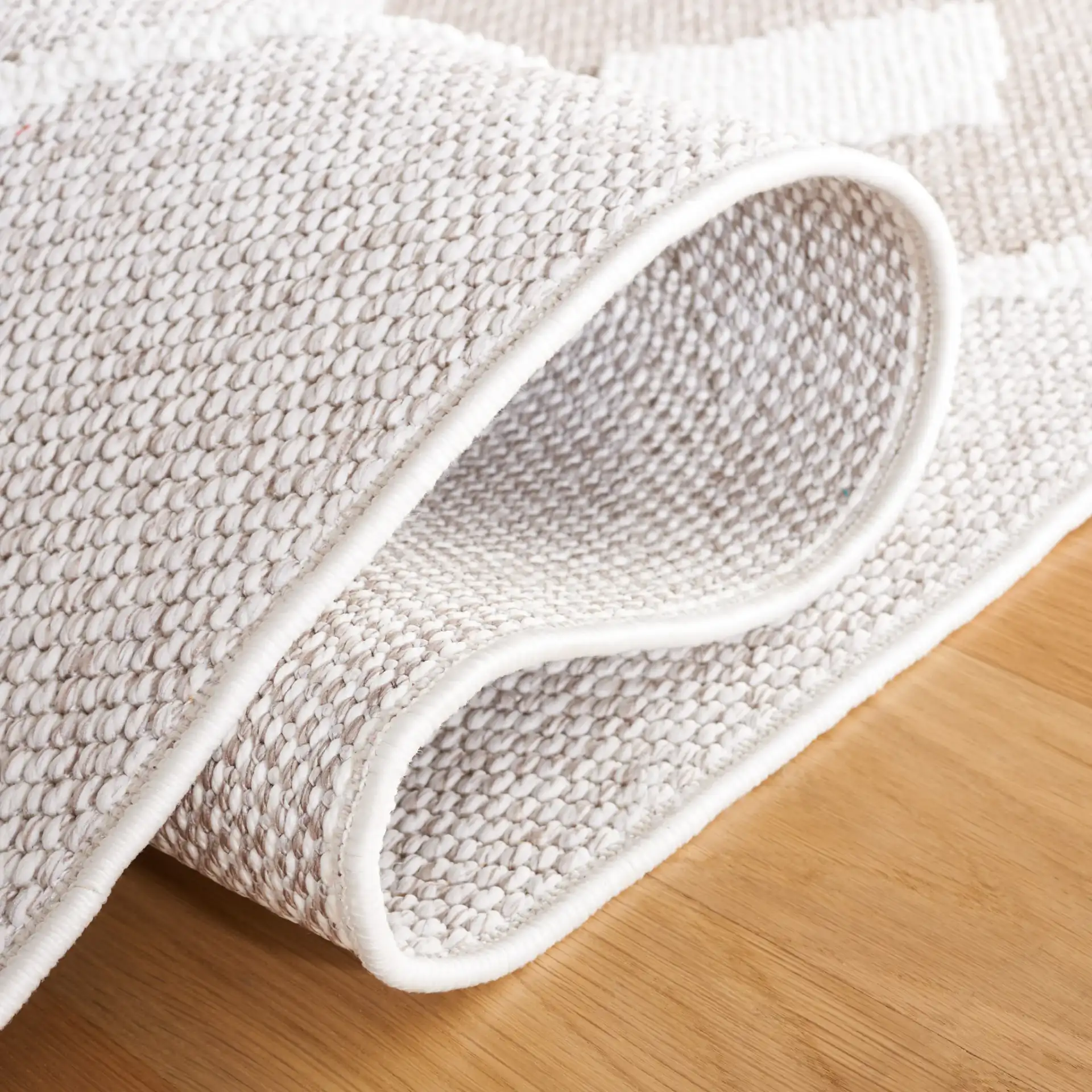 Lotus Nested Diamond Lattice Rug in Beige / Ivory in a styled room