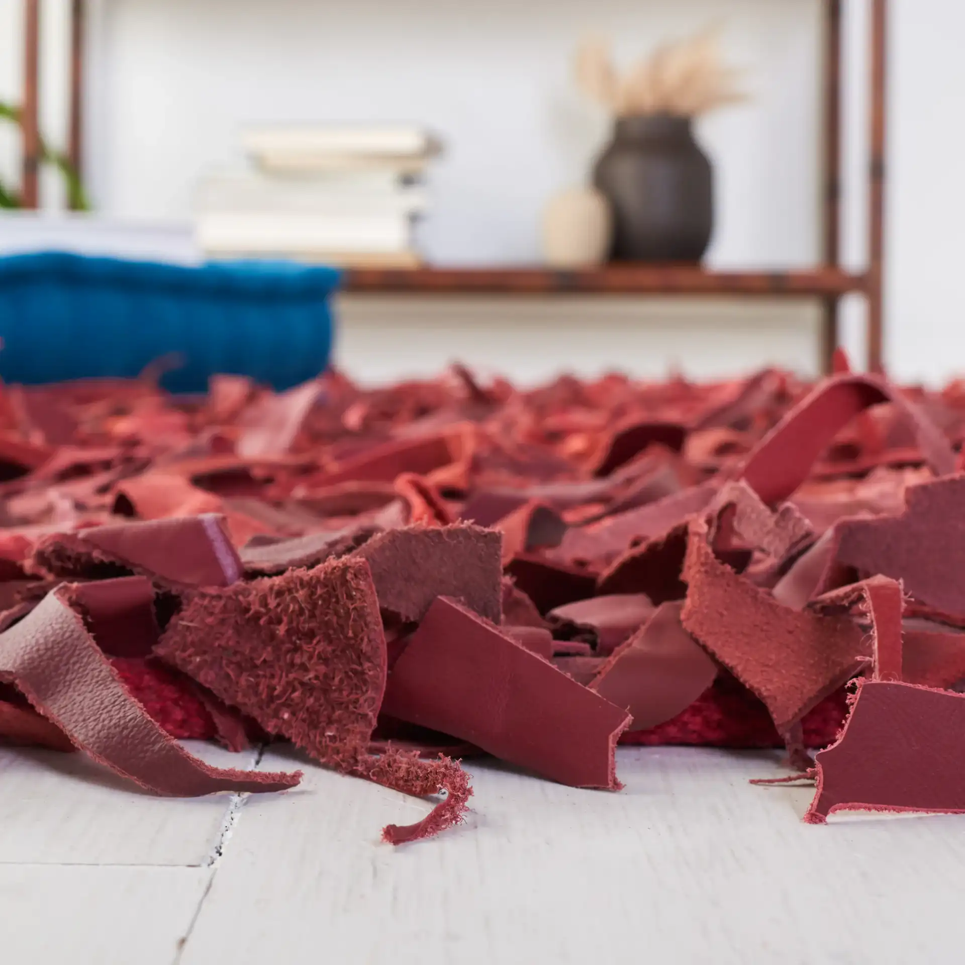 Leather Shag Solid Rug in Red in a styled room