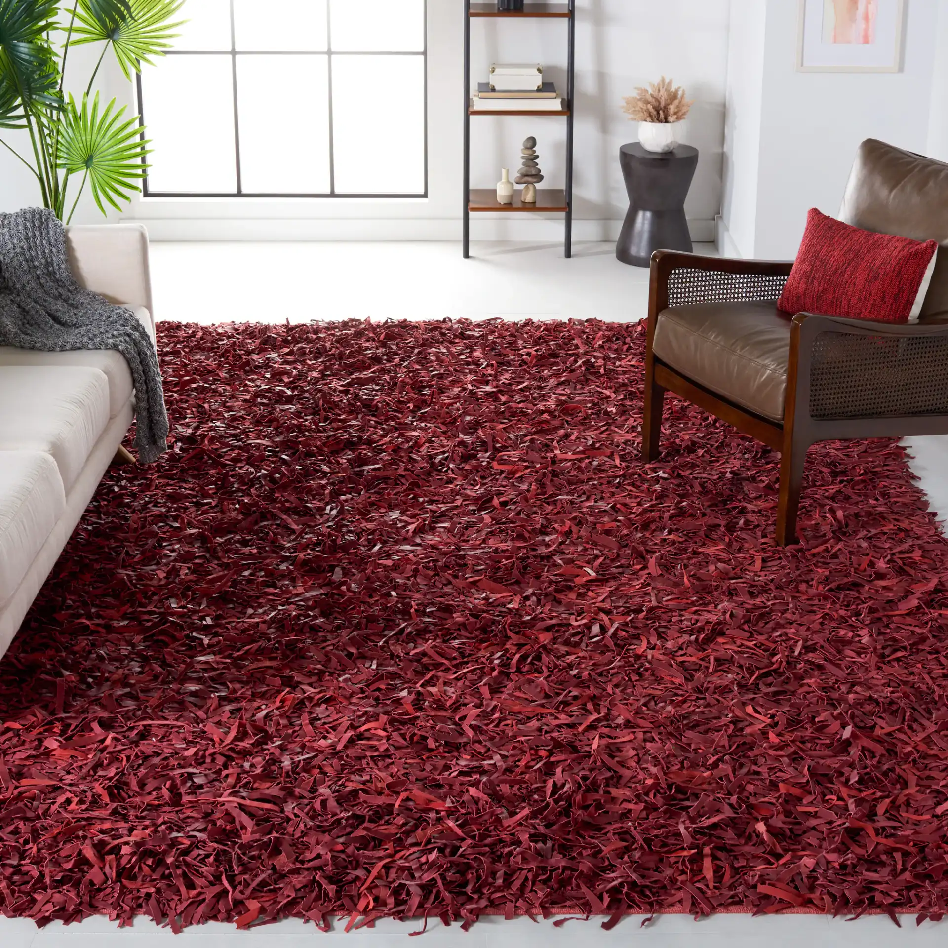 Leather Shag Solid Rug in Red in a styled room