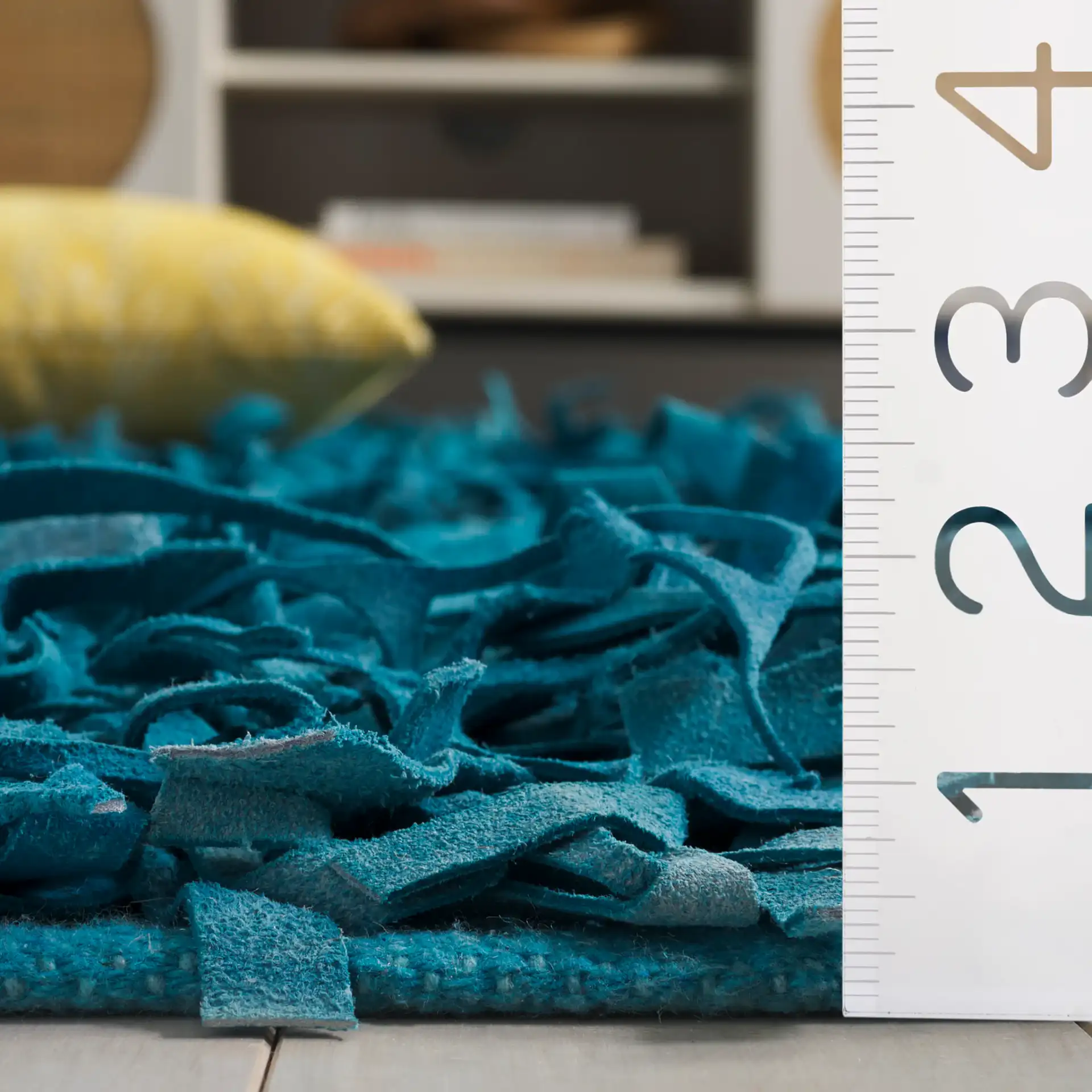 Leather Shag Solid Rug in Light Blue in a styled room