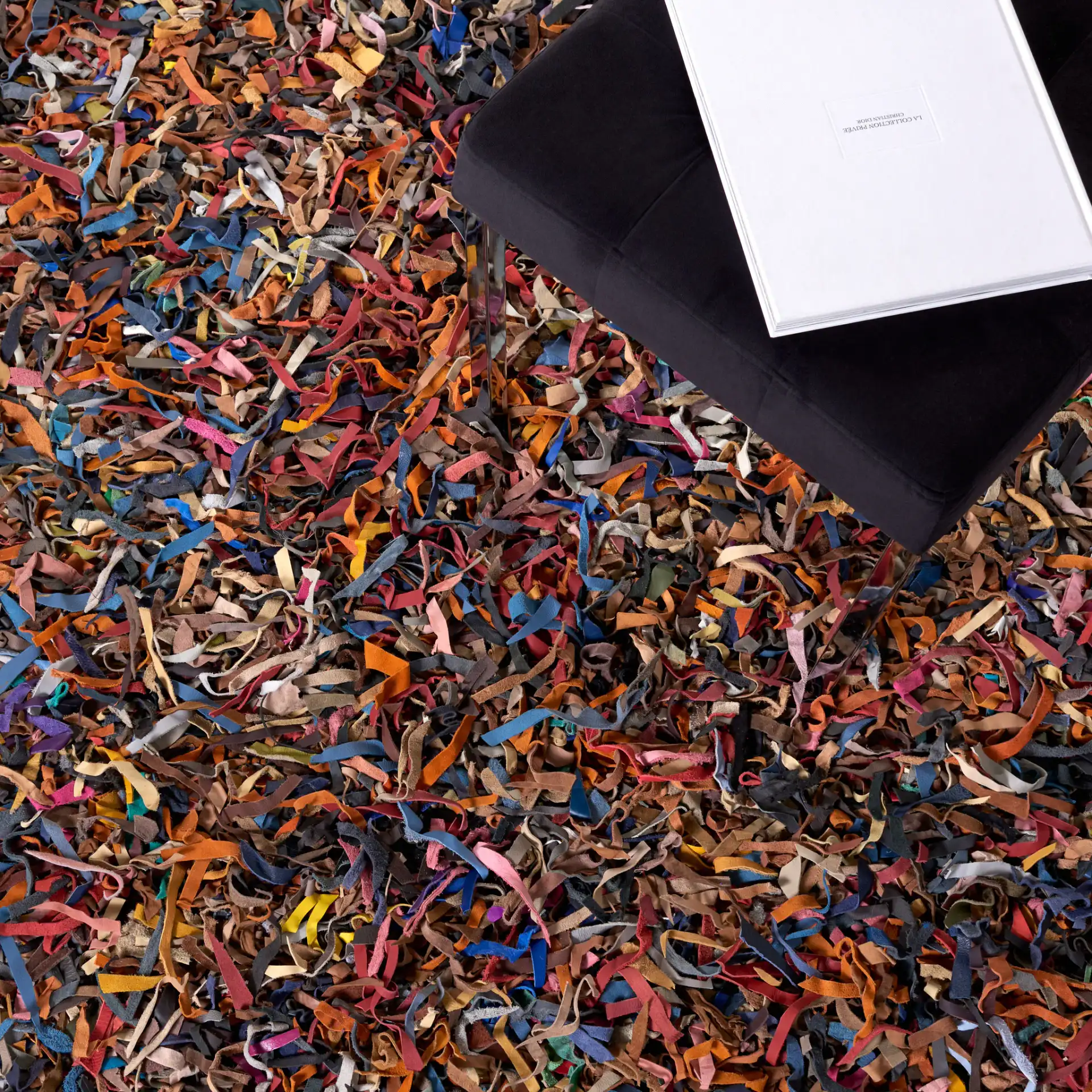 Leather Shag Solid Rug in Multicolor in a styled room