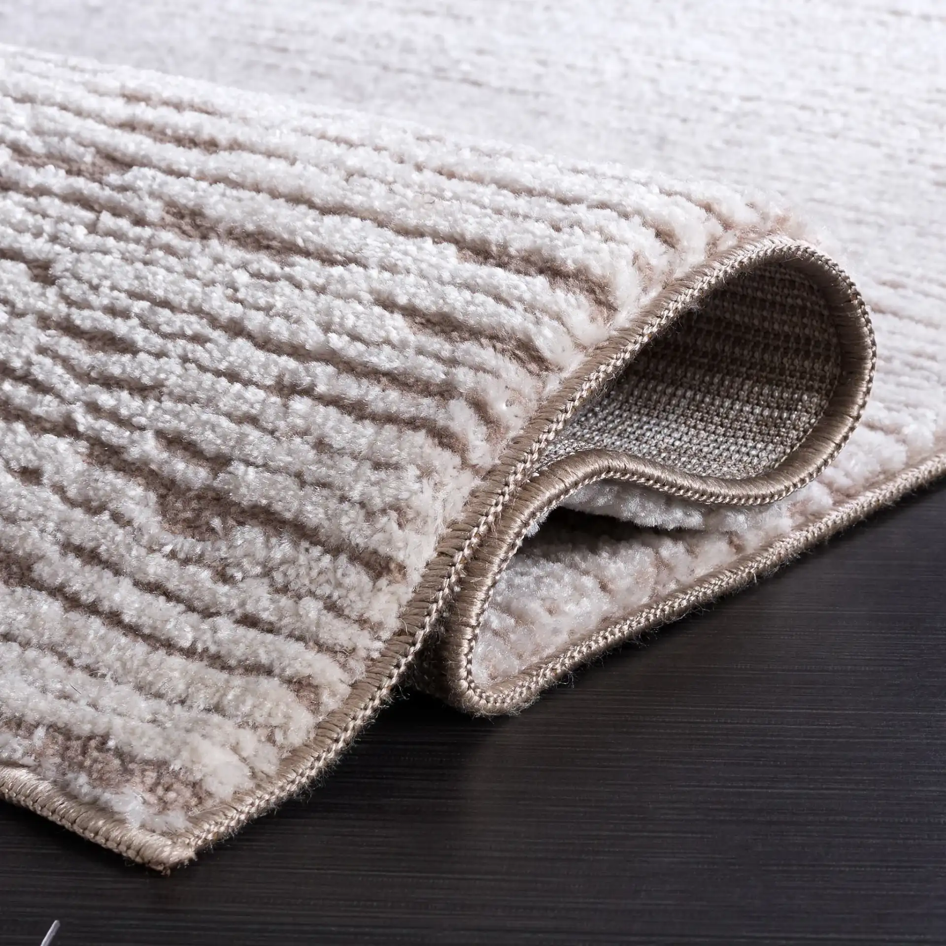 Lunara Striated Line Rug in Beige / Ivory in a styled room
