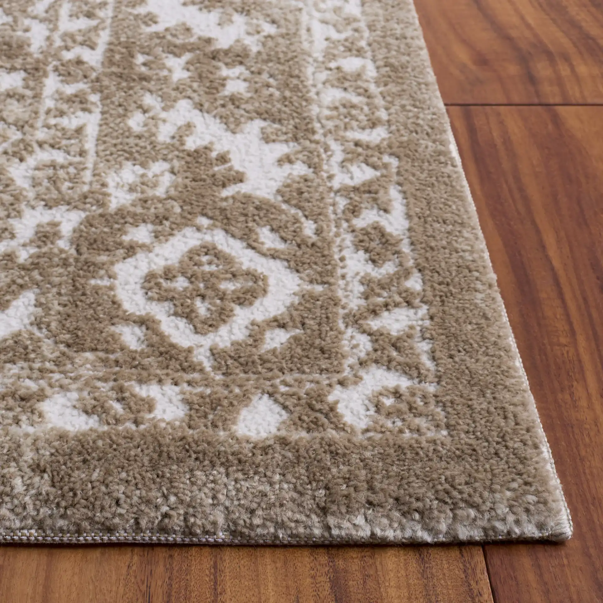 Lunara Abstract Distressed Rug in Beige / Ivory in a styled room