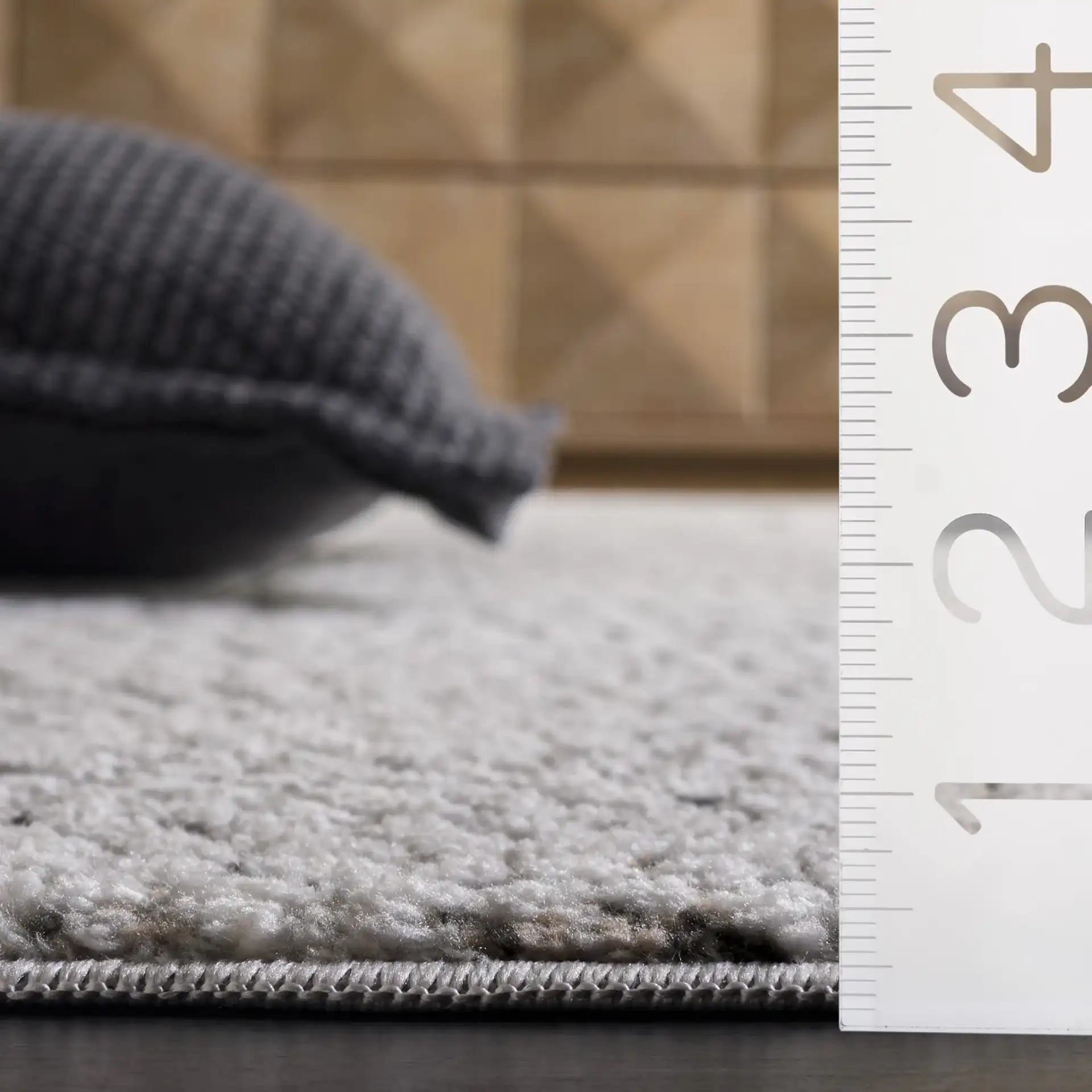 Lunara Pebble Mosaic Rug in Charcoal / Ivory in a styled room