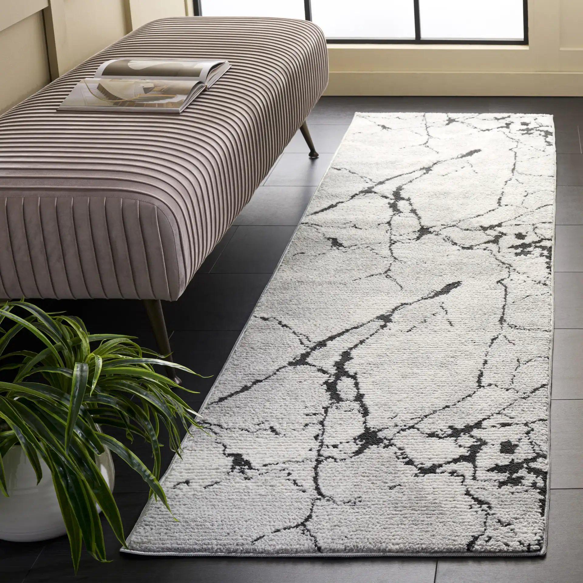 Lunara Modern Marble Rug in Ivory / Charcoal in a styled room